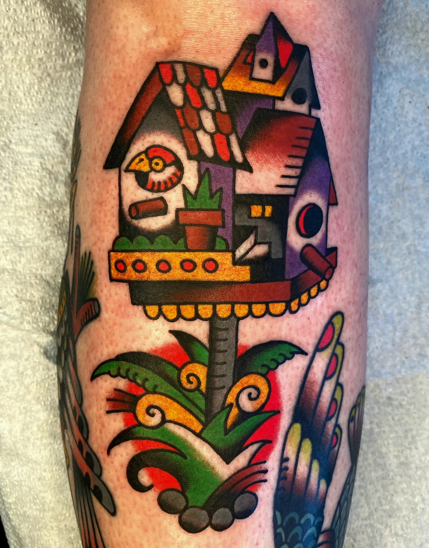 Birdhouse American traditional tattoo on the forearm by Quinn, Kansas City, Missouri