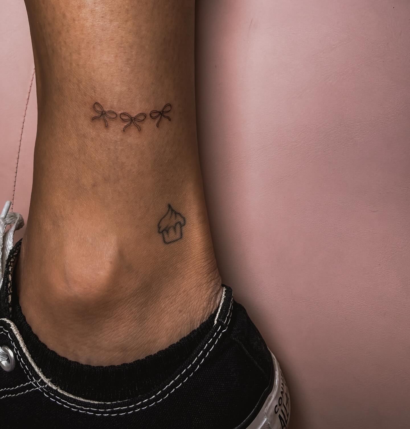 Bows and cupcake fine line tattoo on the calf by π»ππ π
ππππ Tattoo Artist, Las Vegas, Nevada