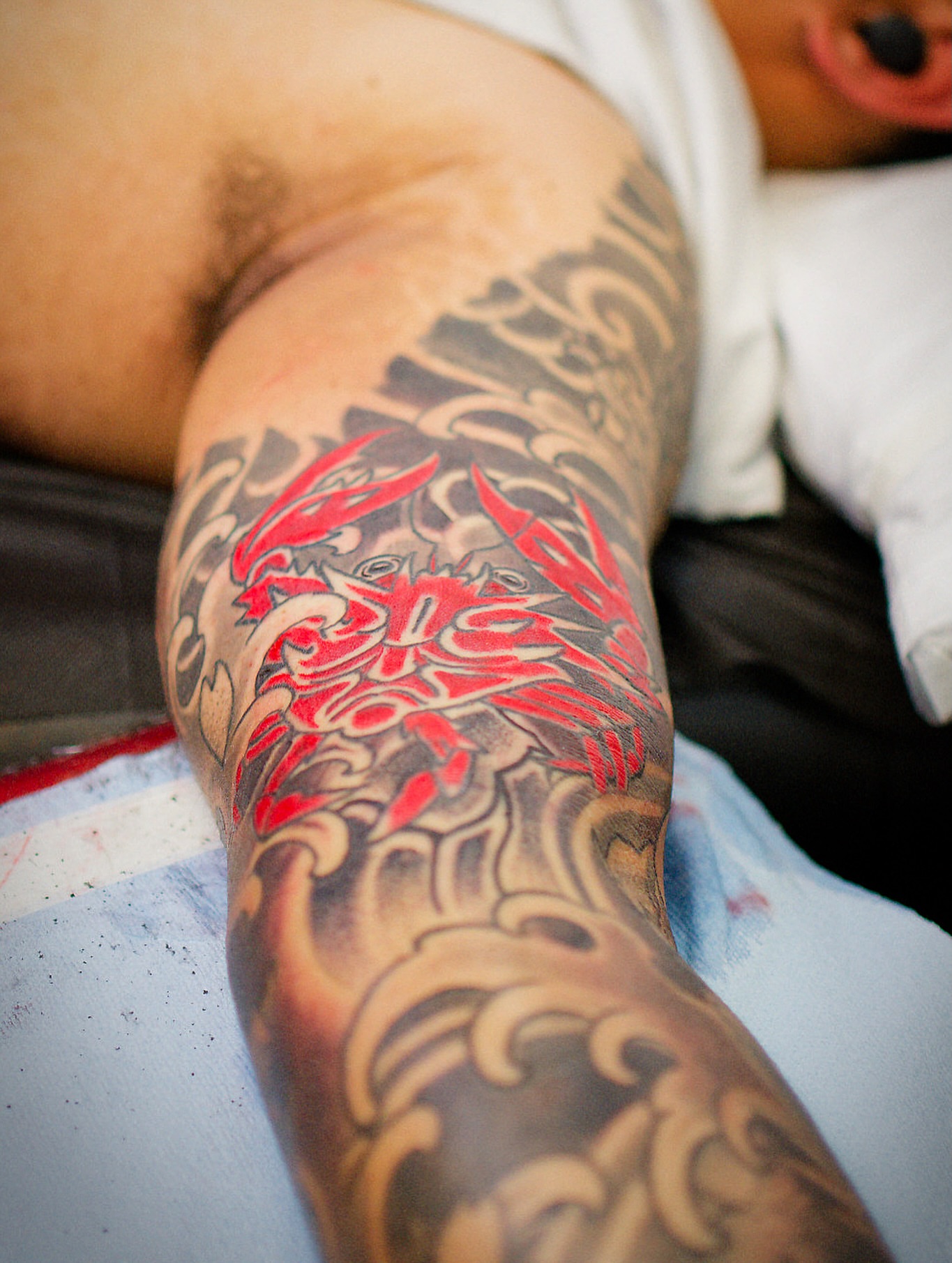 Red dragon japanese irezumi tattoo on the forearm by Chris Cockrill