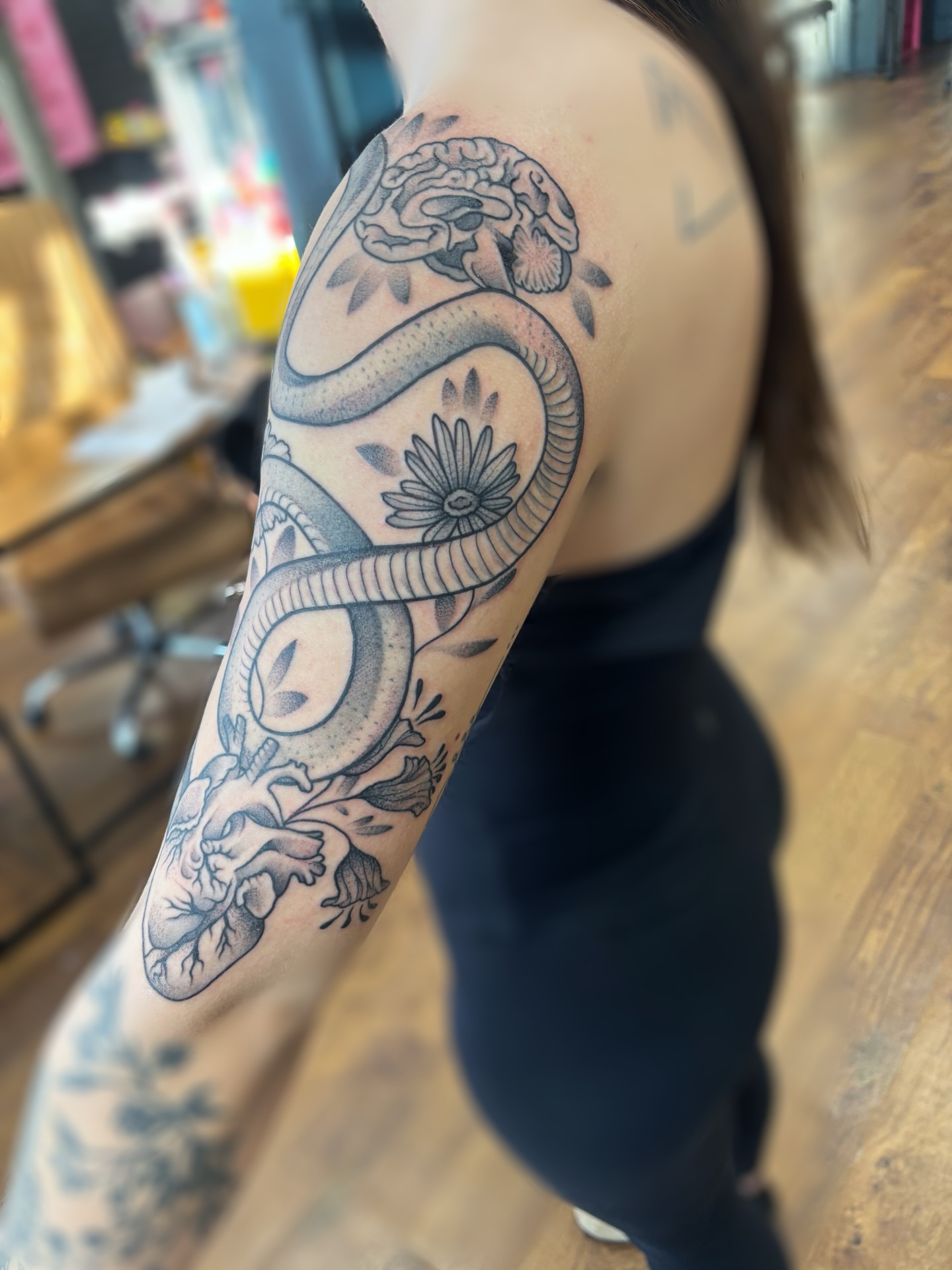 Snake and peony black and grey tattoo on the forearm by ✿ sadie winter ✿