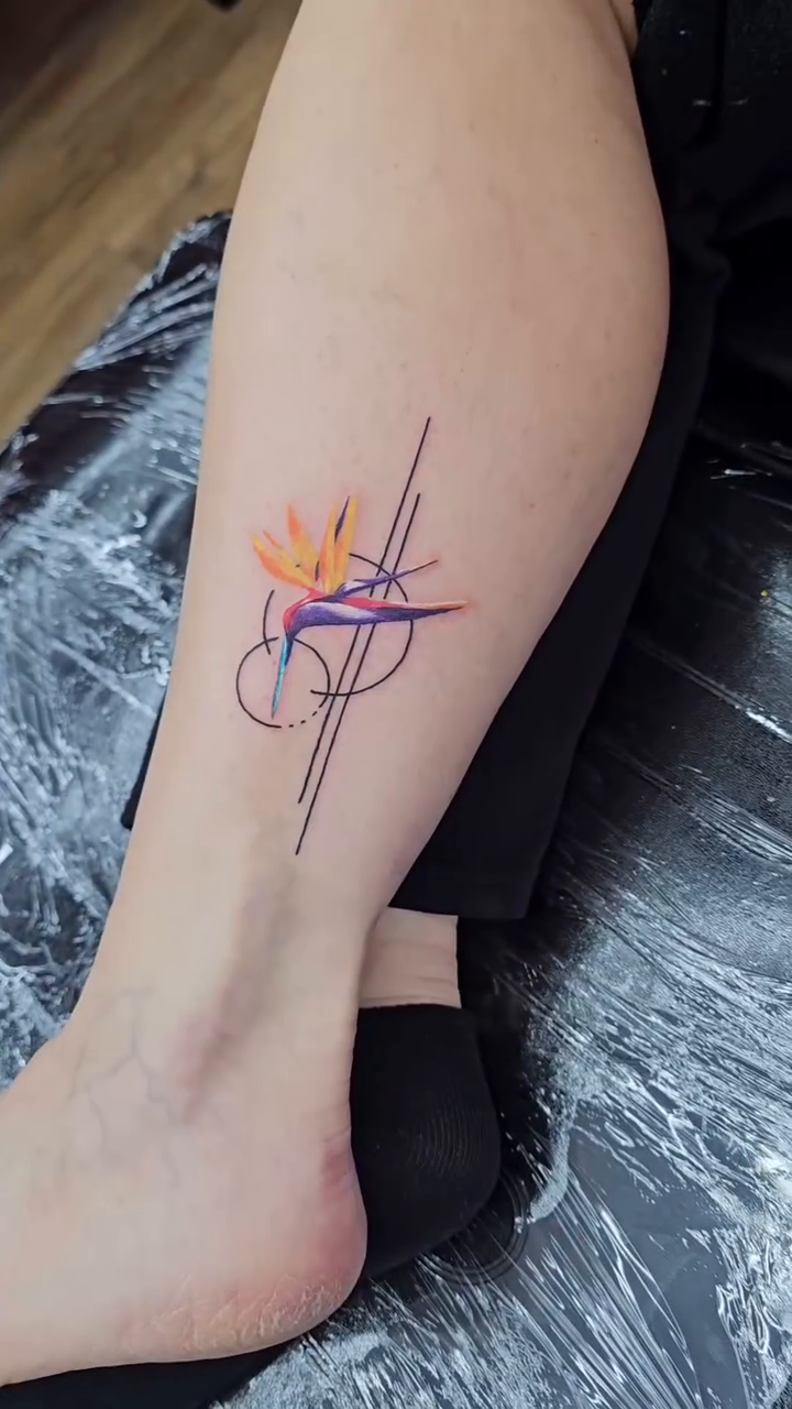 Watercolor tattoo on the foot by John Briceño, Columbus, Ohio