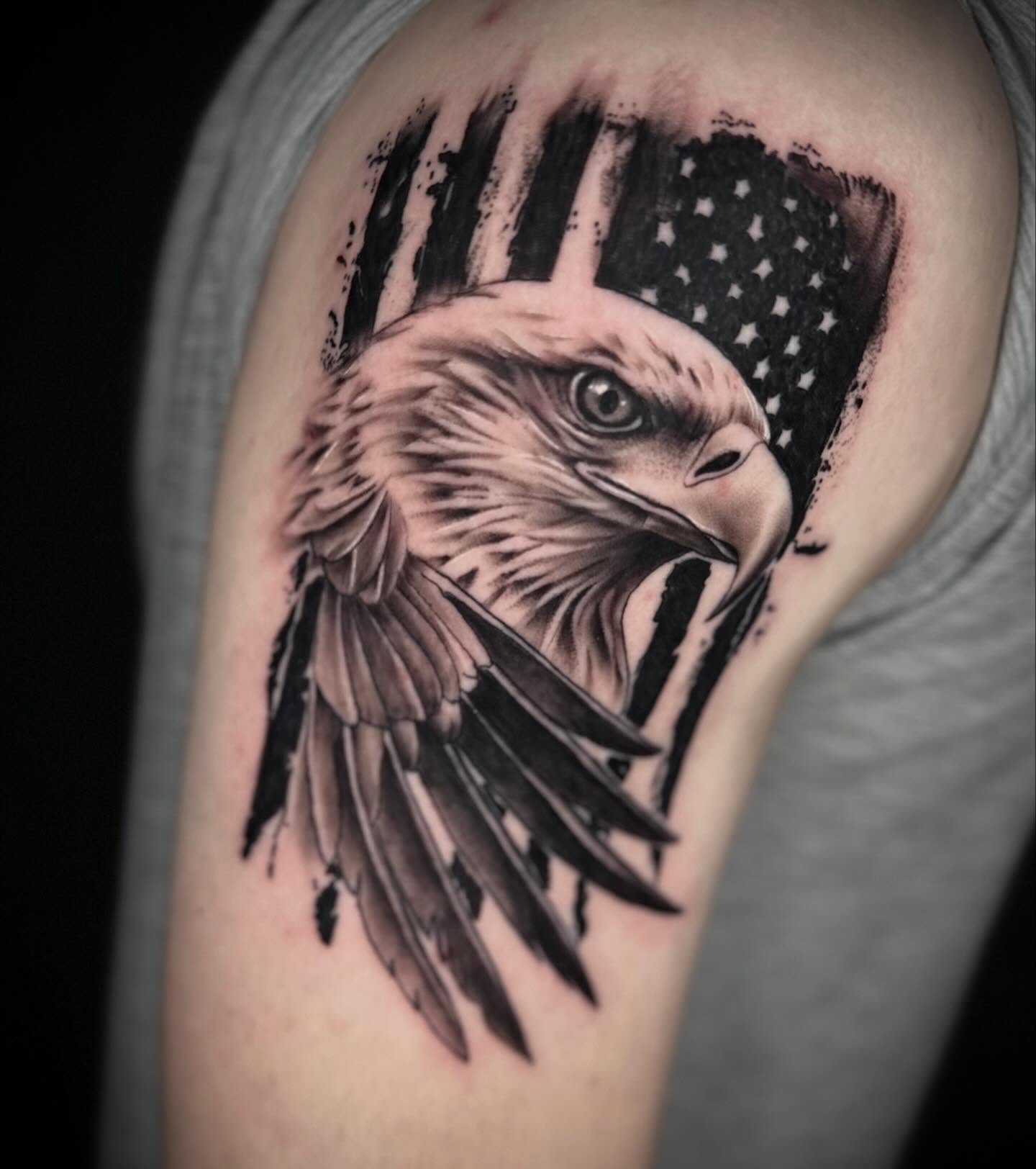 Eagle realism tattoo on the shoulder by Terence Taylor