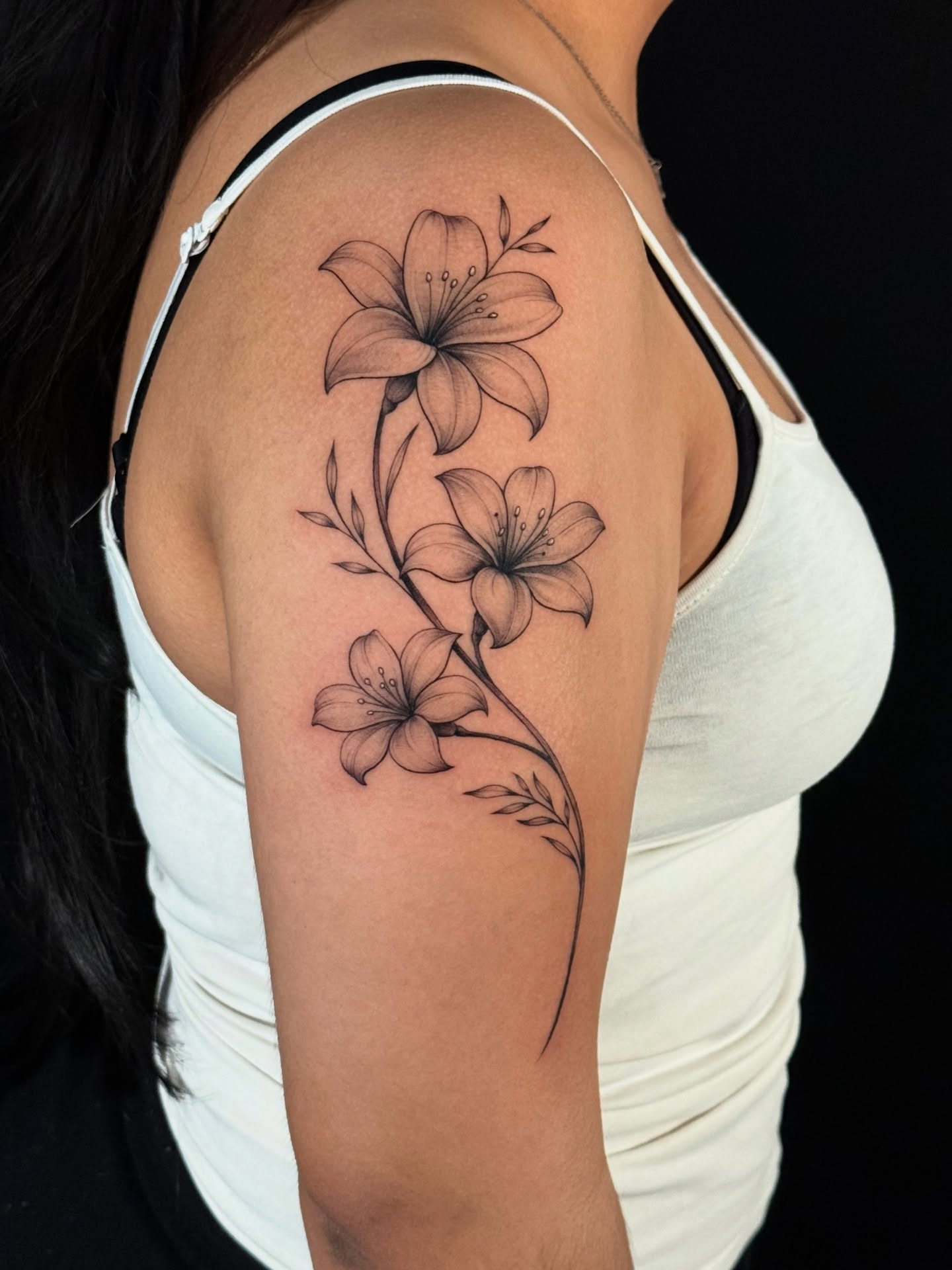 Lilies black and grey tattoo on the shoulder by HAiZiE