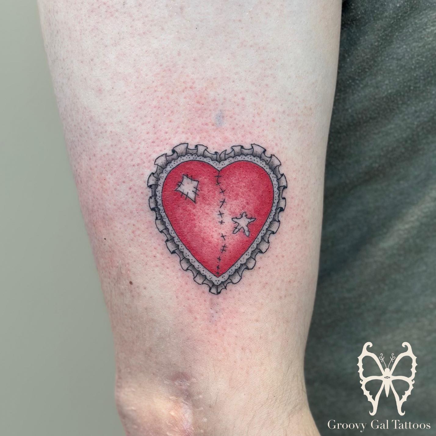 Heart American traditional tattoo on the forearm by Groovy P