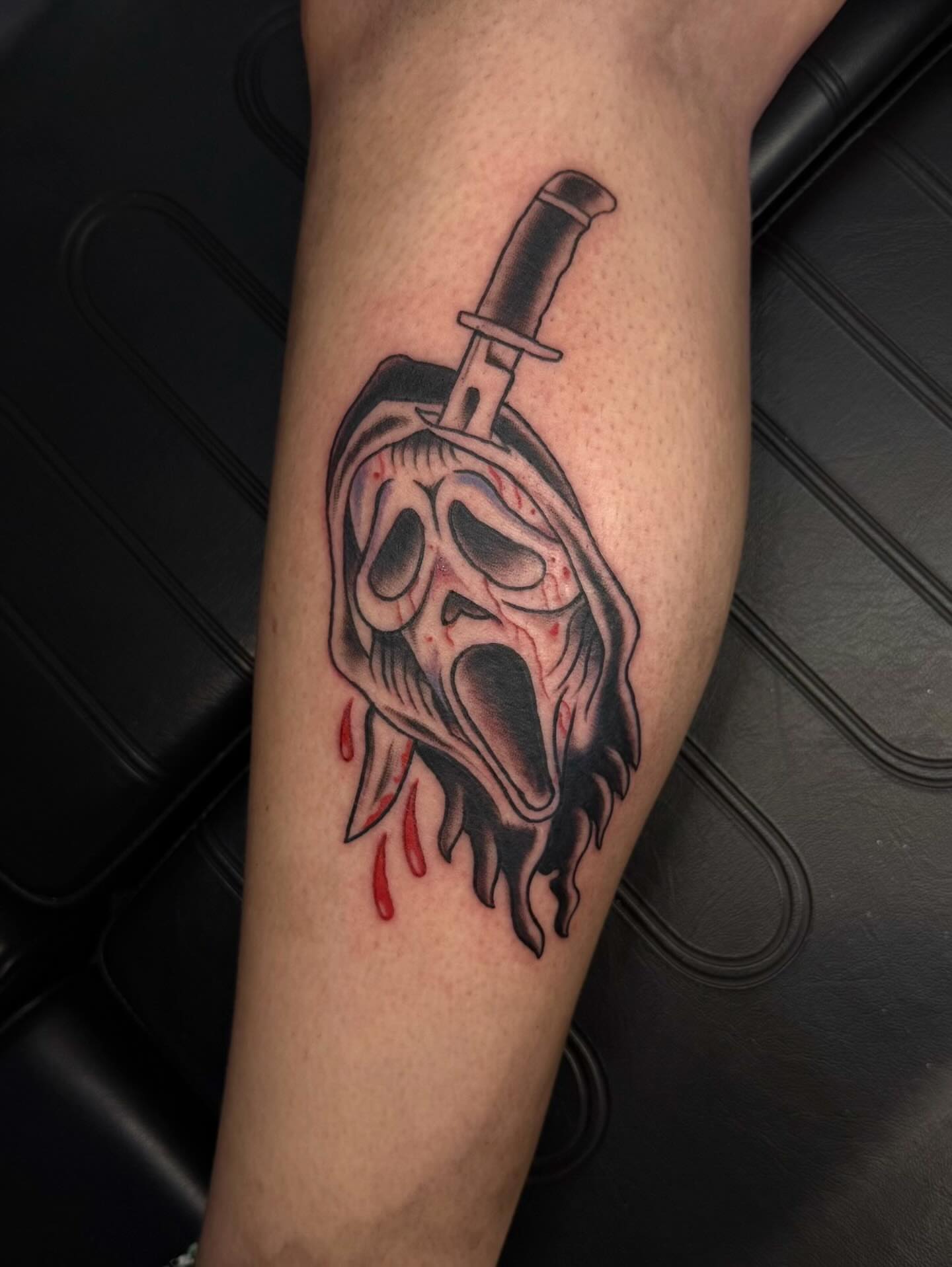 Skull with knife dark realism tattoo on the forearm by π©Έβ βοΈ ππππ βοΈ βπ©Έ