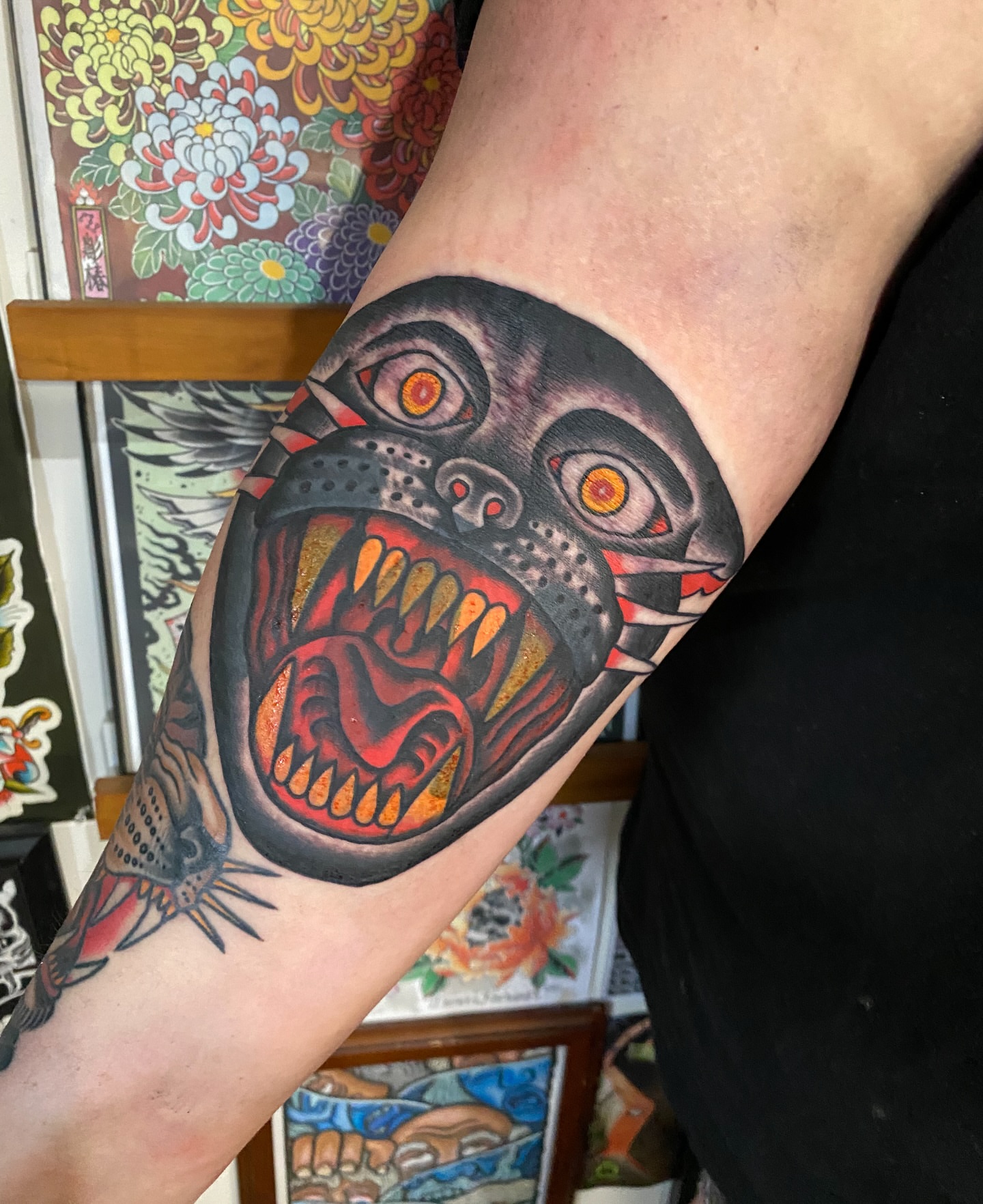 Angry dog American traditional tattoo on the forearm by sean drennen