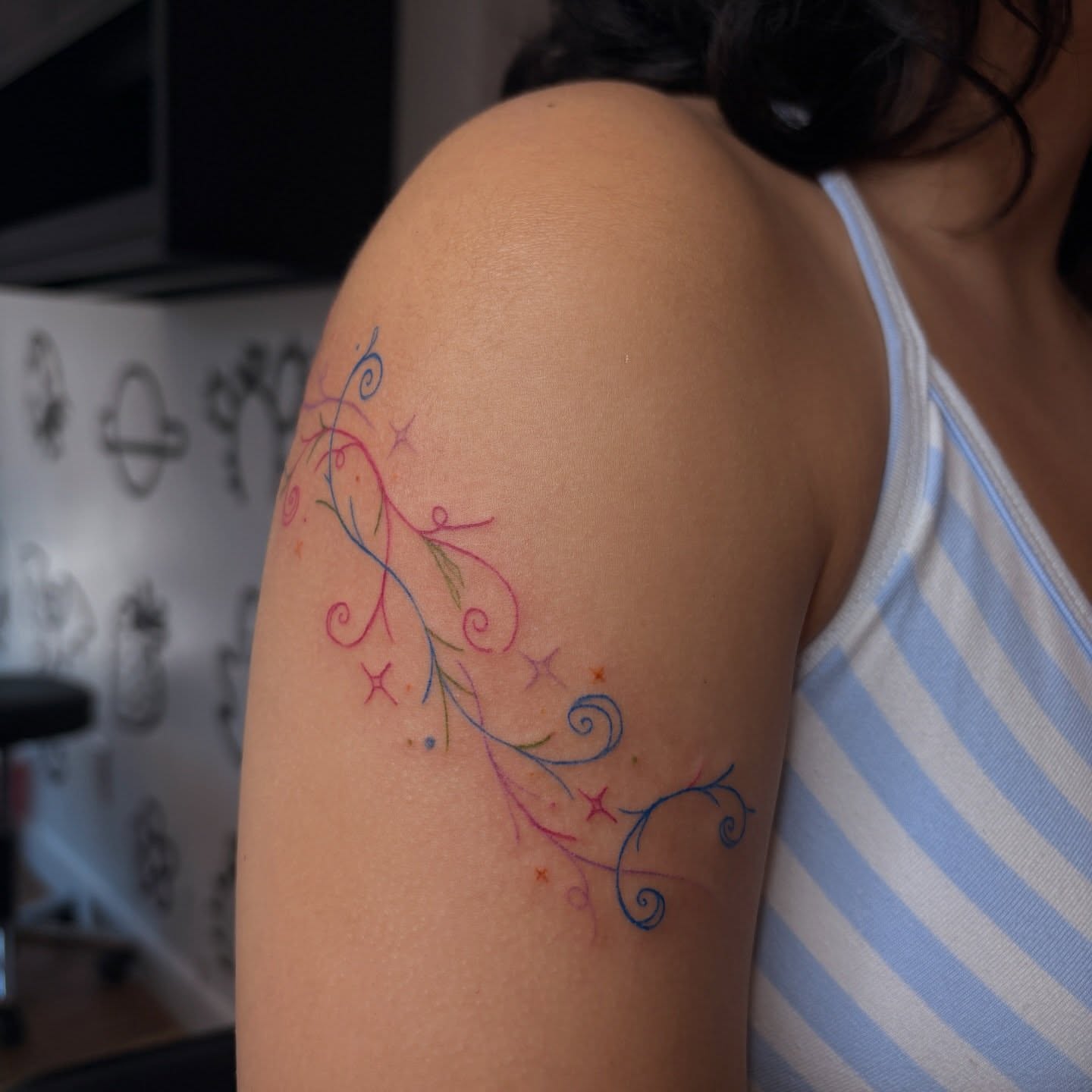 Floral vine watercolor tattoo on the shoulder by Emma🌸✨Austin Tattoo Artist