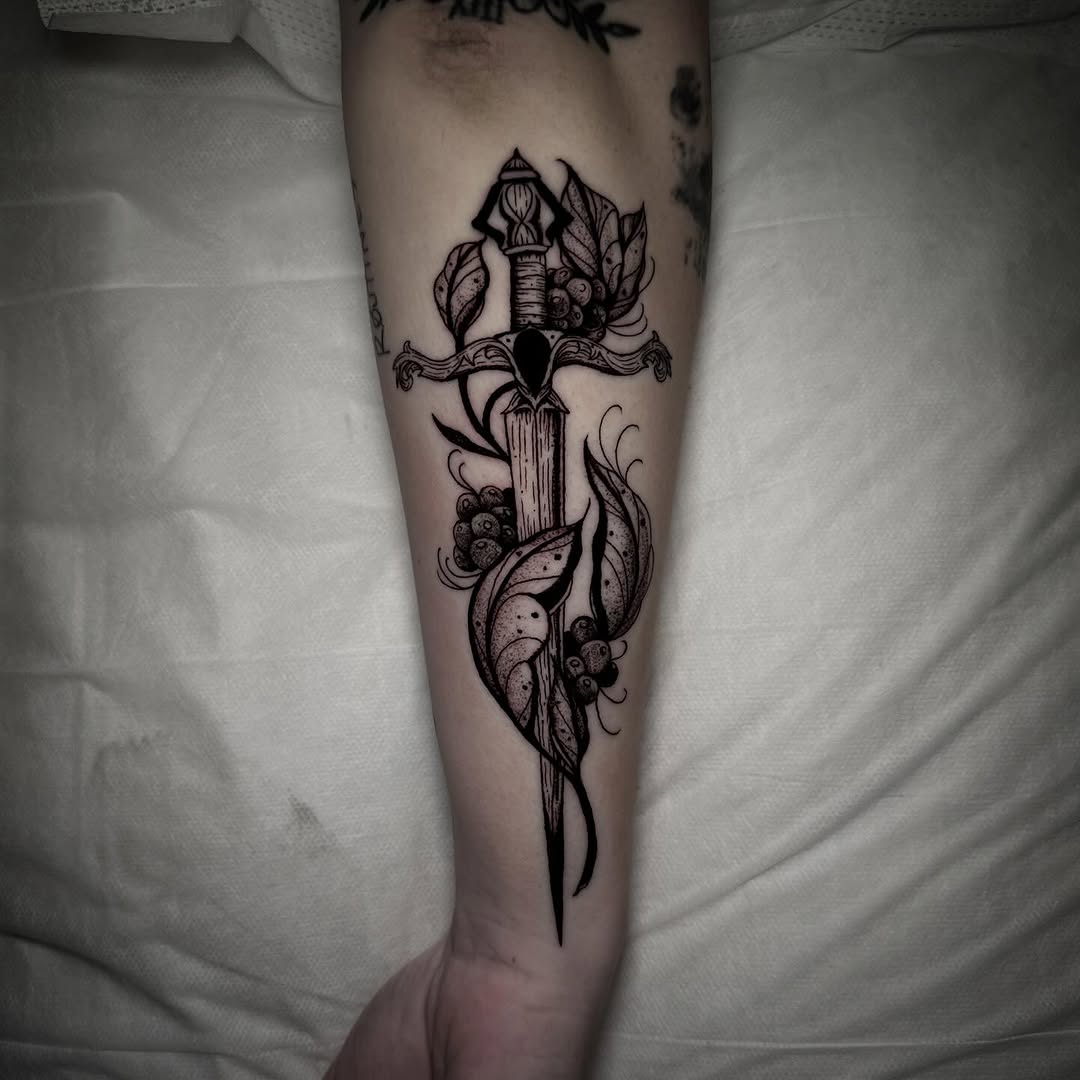 Sword with leaves and berries ornamental tattoo on the forearm by 🕸 ᴠɪᴠɪᴀɴ ʟᴏʀᴇ 🕸, Nashville, Tennessee