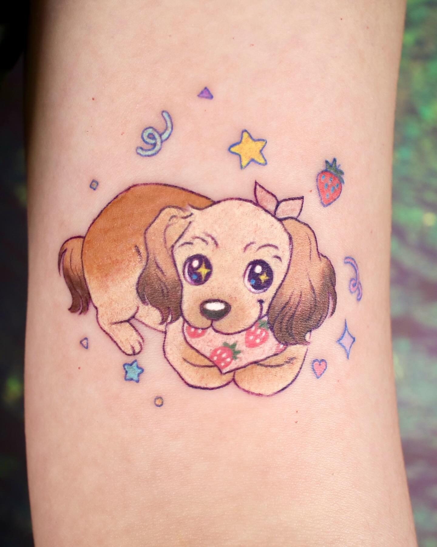 Dog with strawberry dotwork tattoo on the forearm by 밍꽈 타투