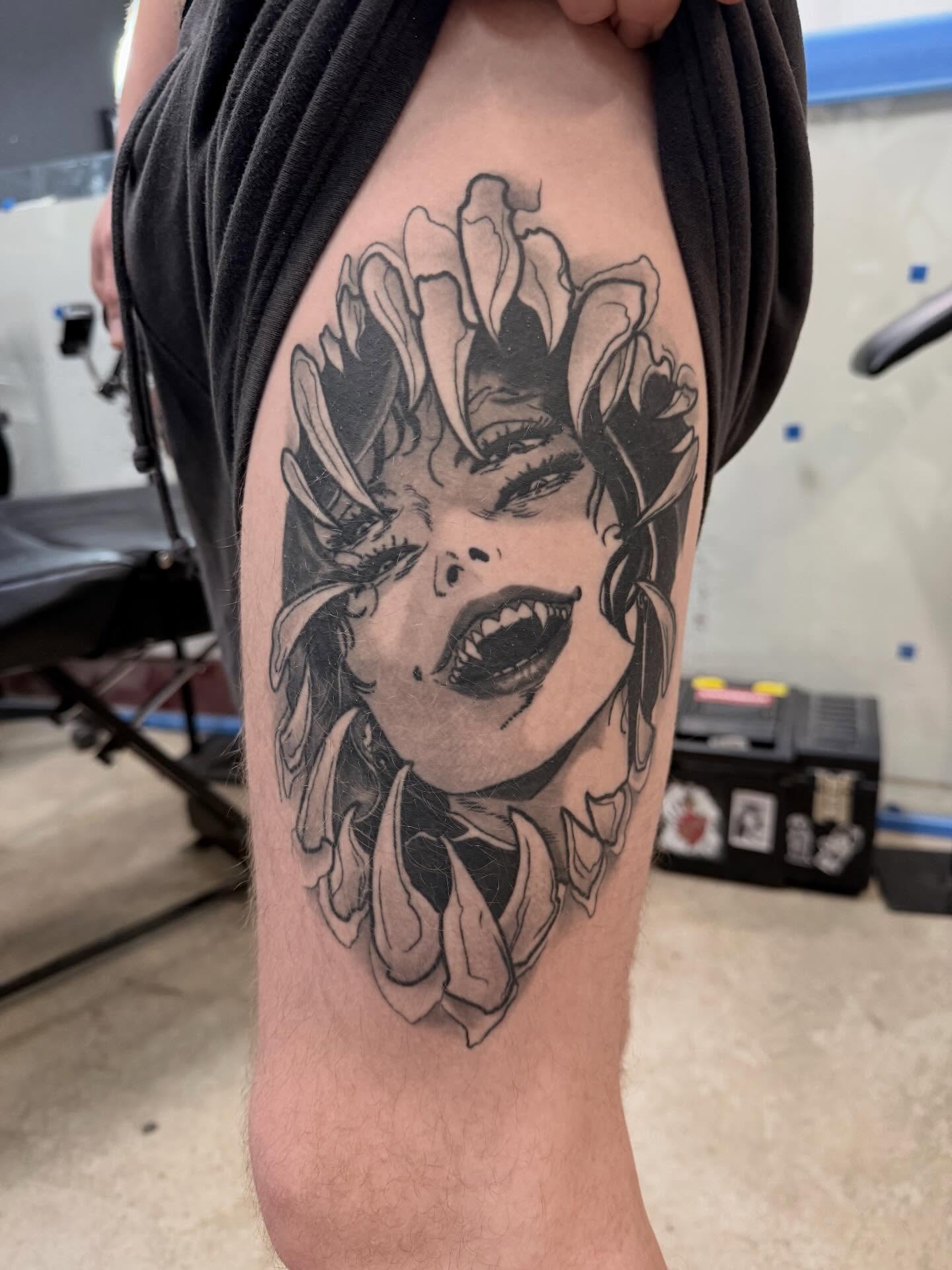 Woman's face realism tattoo on the forearm by H.G