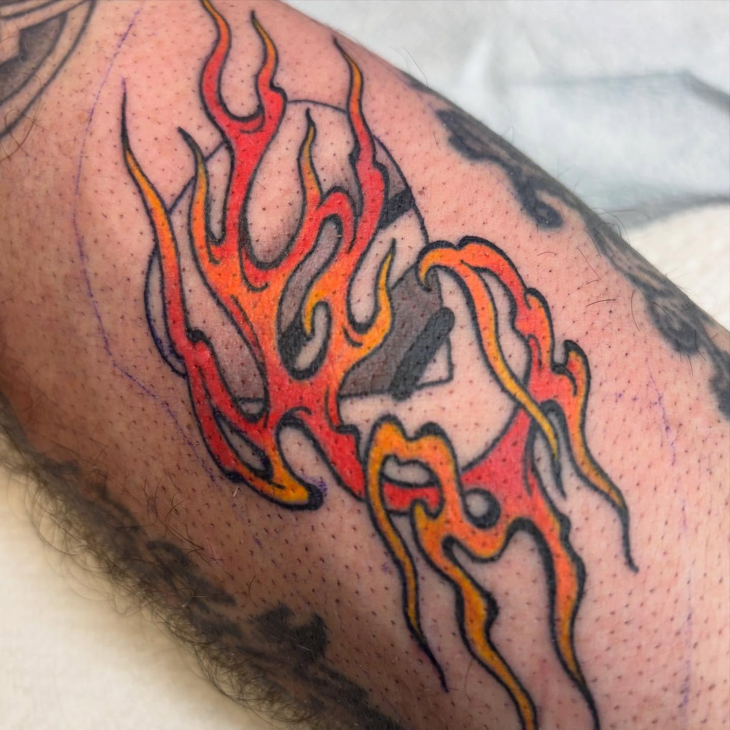 Flames new school tattoo on the forearm by dayton skuse, Portland, Oregon