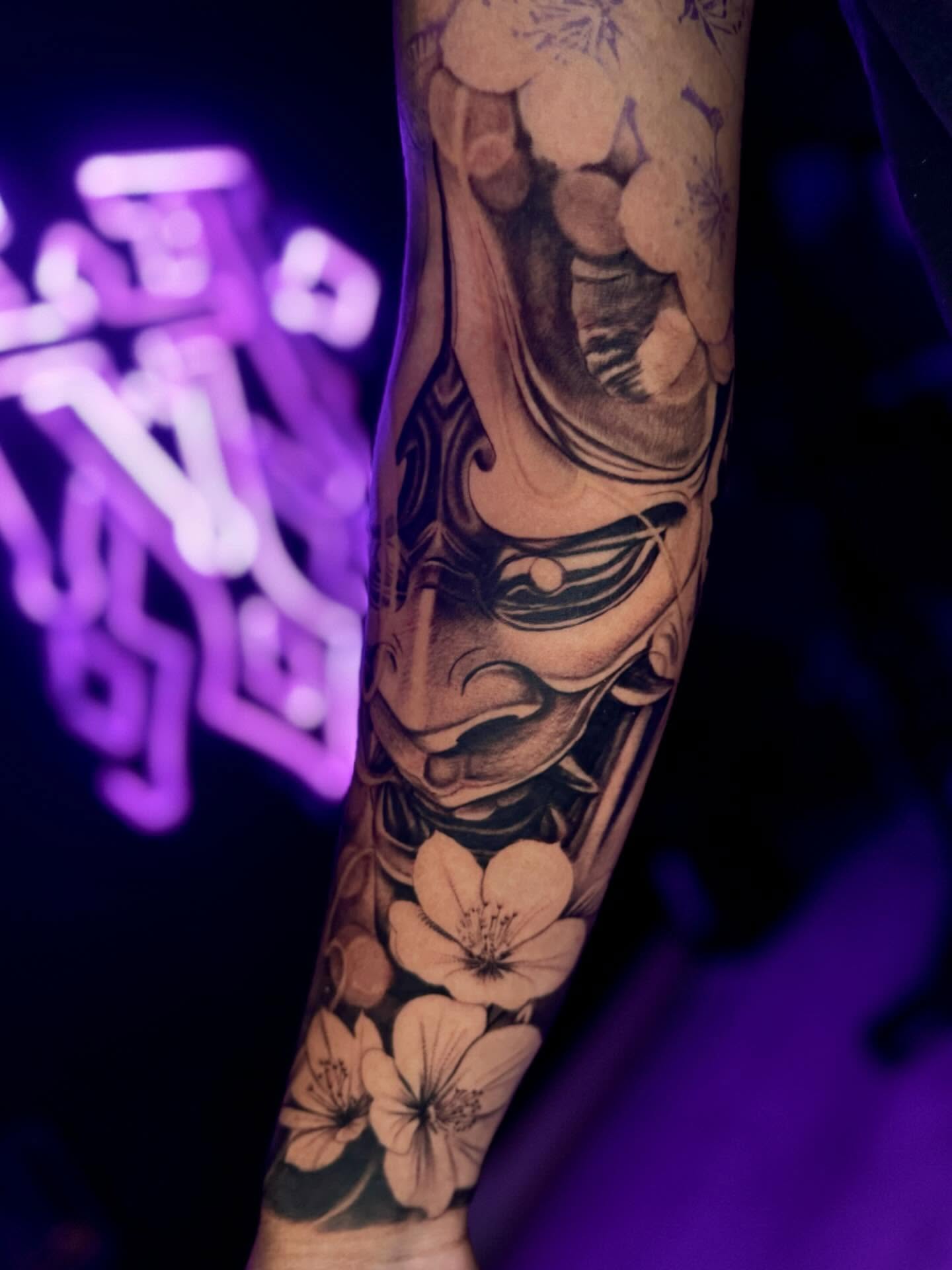 Cherry blossoms and samurai armor japanese irezumi tattoo on the forearm by SID OU - Tattoo Artist