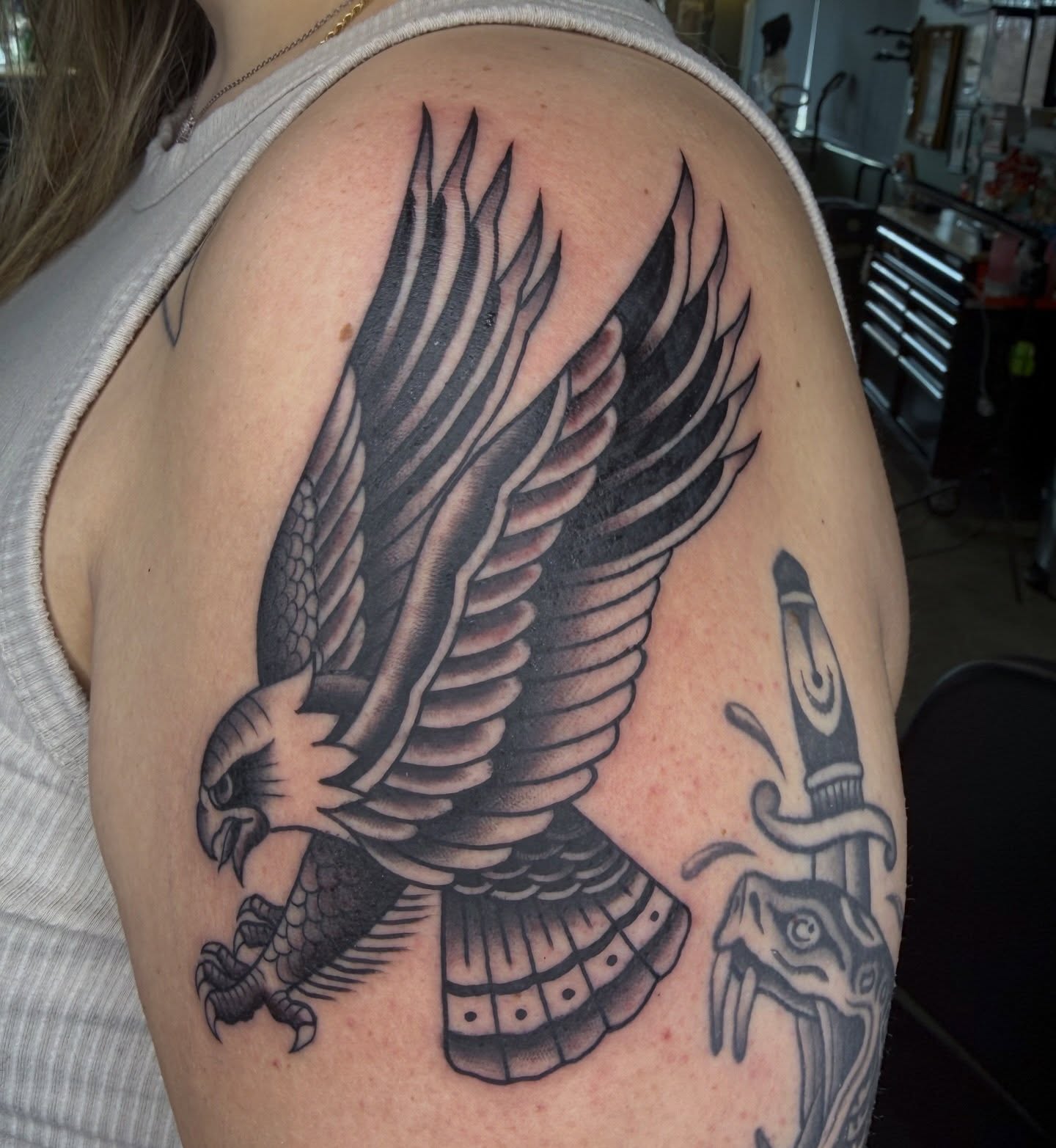 Eagle and snake realism tattoo on the shoulder by @chrisskon, Carpentersville, Illinois