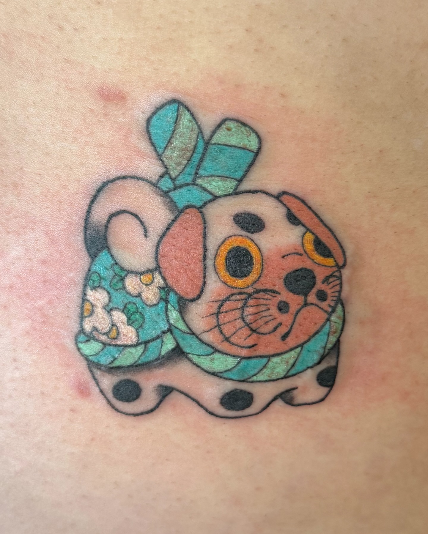 Dog new school tattoo on the back by binh