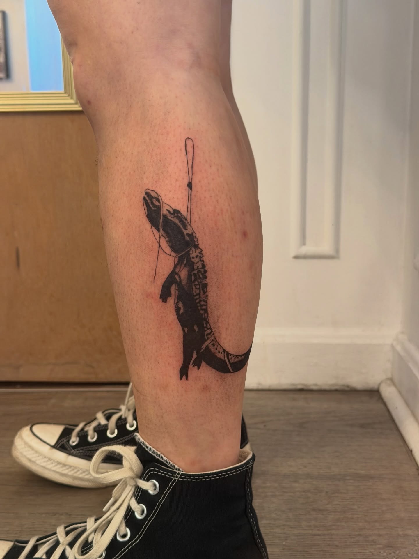 Fish black and grey tattoo on the leg by Alaska