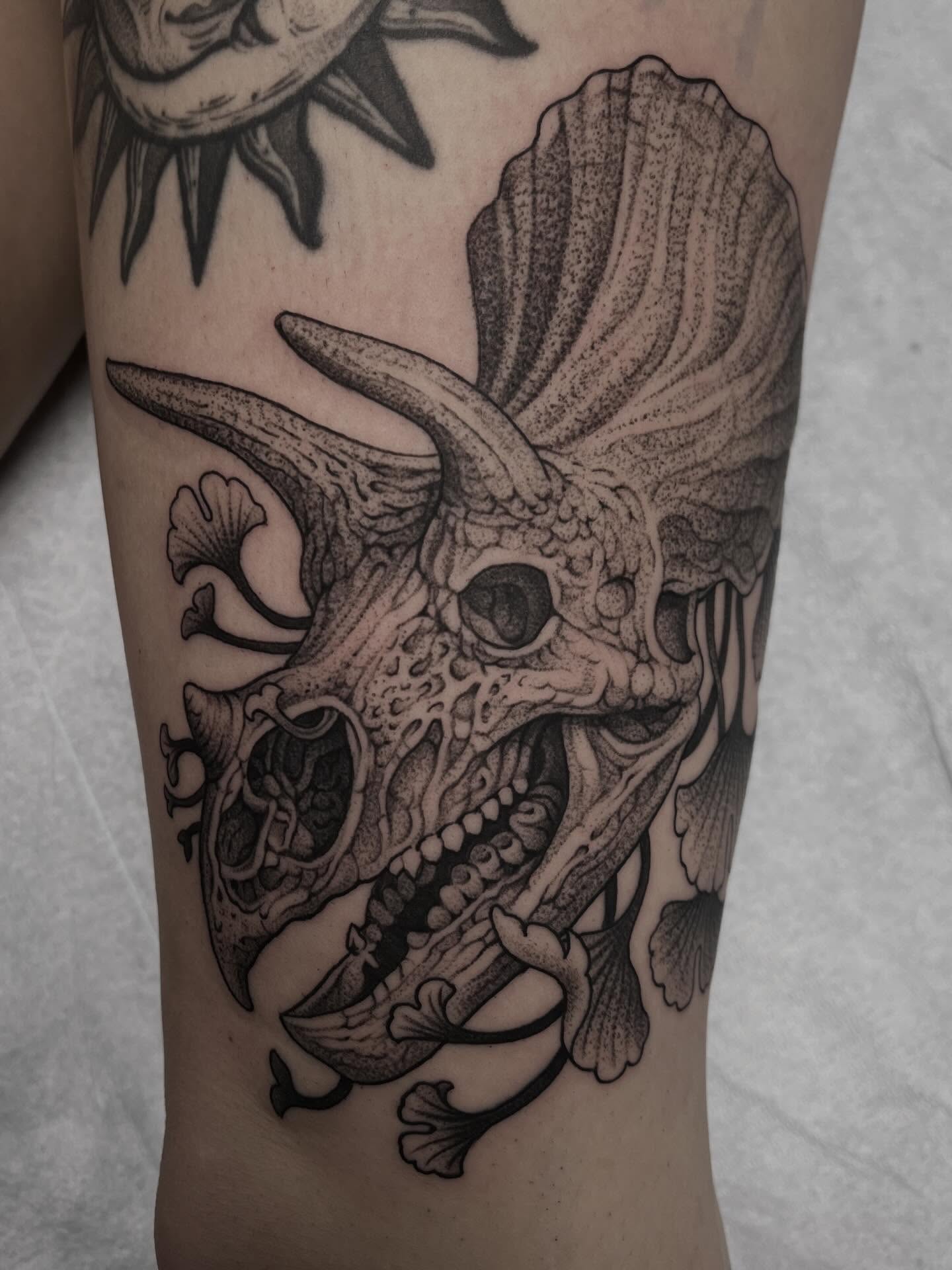 Triceratops skull dotwork tattoo on the forearm by Austin Tattoo Artist