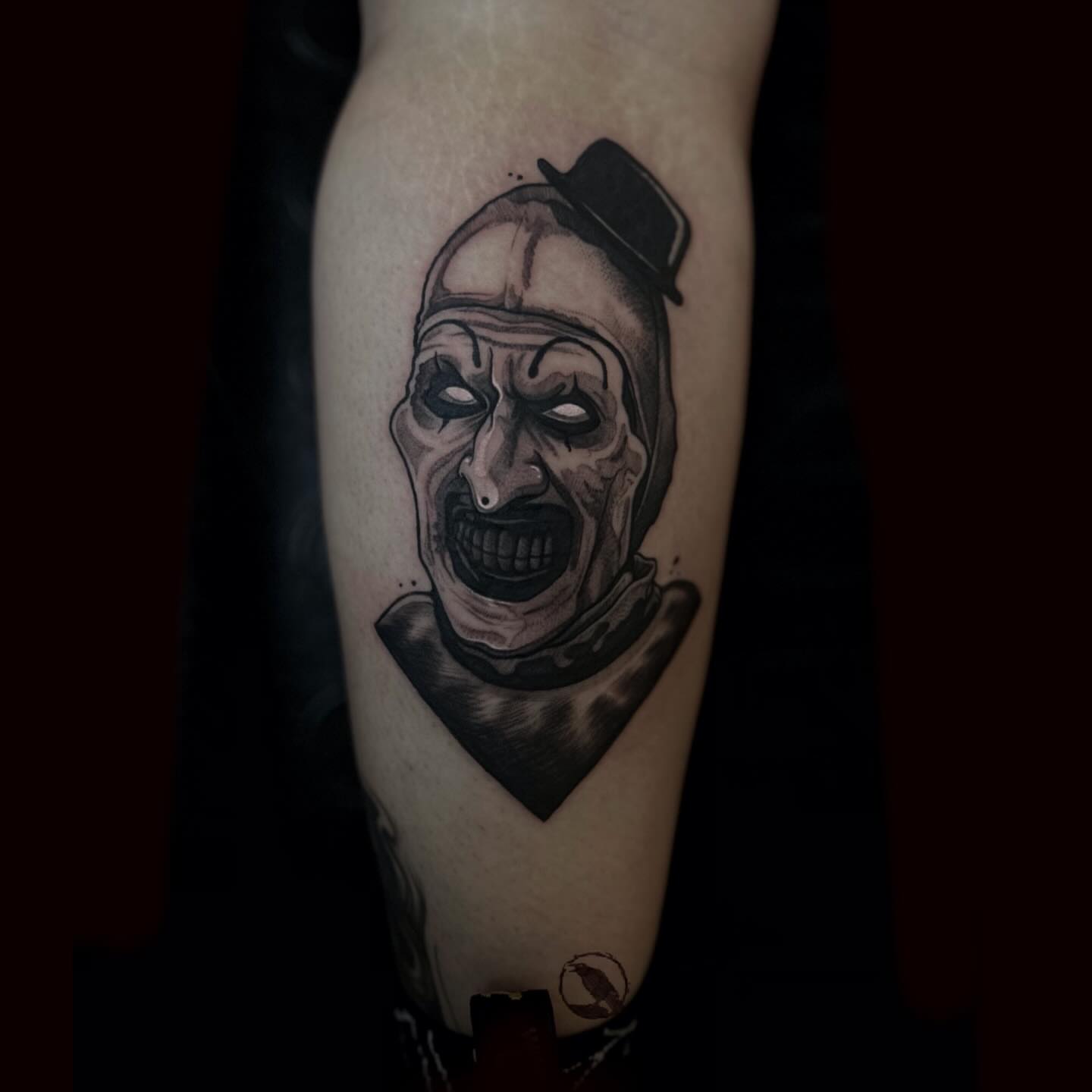 Clown black and grey tattoo on the forearm by 𝕽𝖎𝖌𝖊𝖗𝖘 𝕳𝖆𝖒𝖟𝖆, San Francisco, California