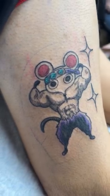 Muscular anime mouse character new school tattoo on the forearm by vannadoestattoos