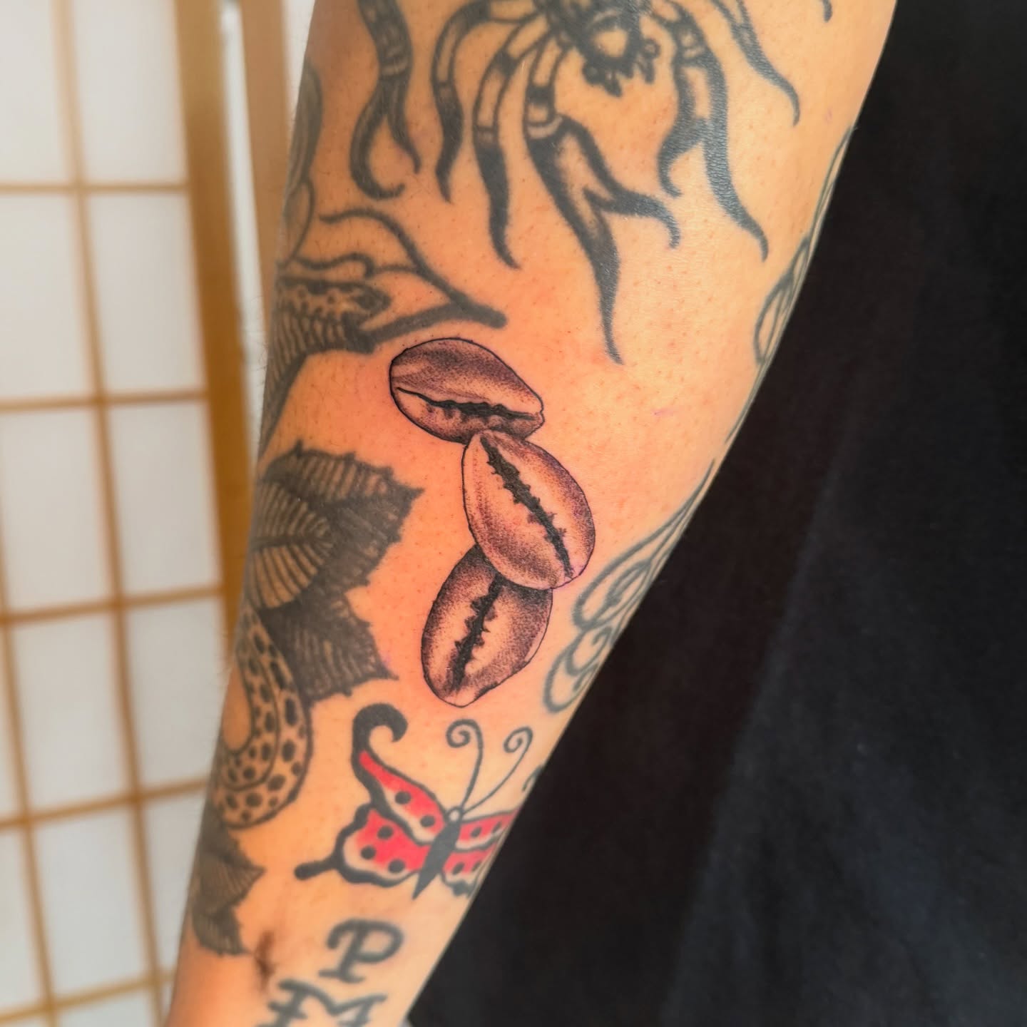 Coffee beans American traditional tattoo on the forearm by hallow ☣︎ tattoo artist, Philadelphia, Pennsylvania