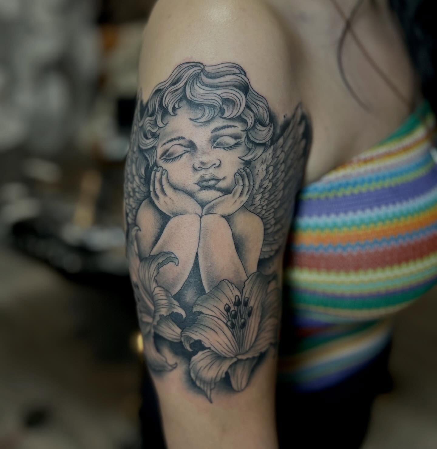 Angel with lilies black and grey tattoo on the forearm by darklord_666