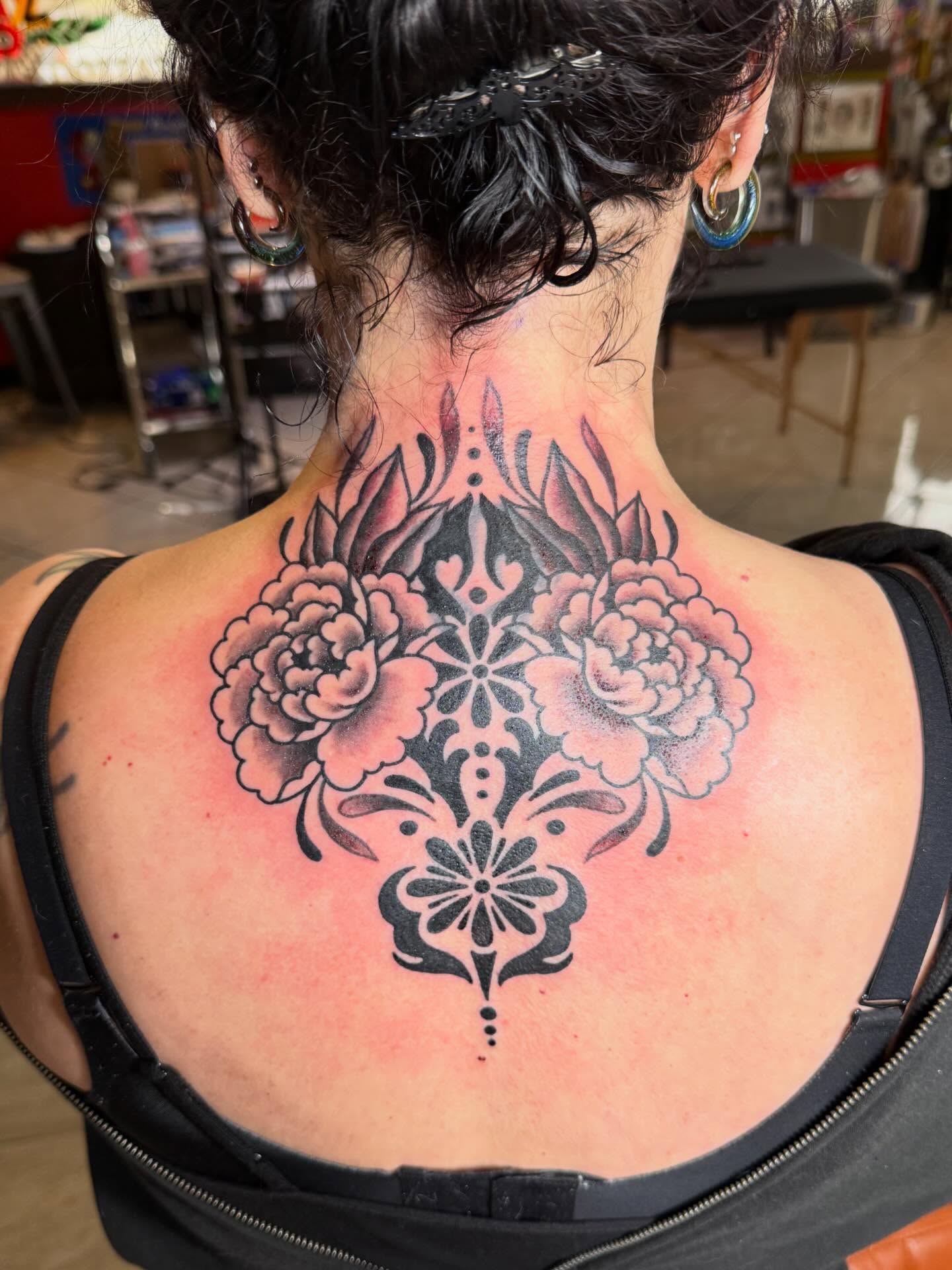 Floral mandala geometric tattoo on the back by Bill Crawford, Plymouth, Michigan
