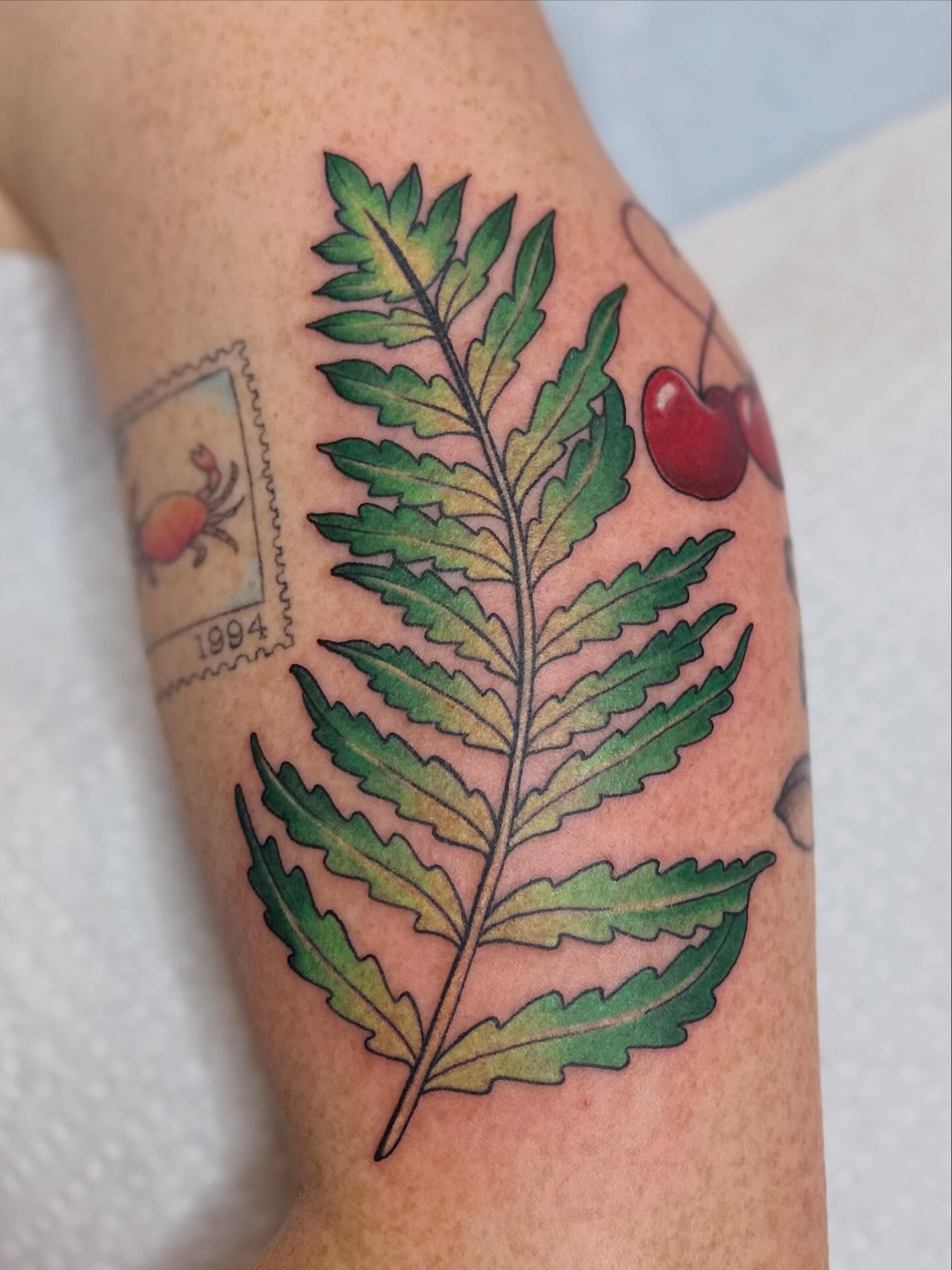 Fern leaf realism tattoo on the forearm by Dani Di Pietrantonio