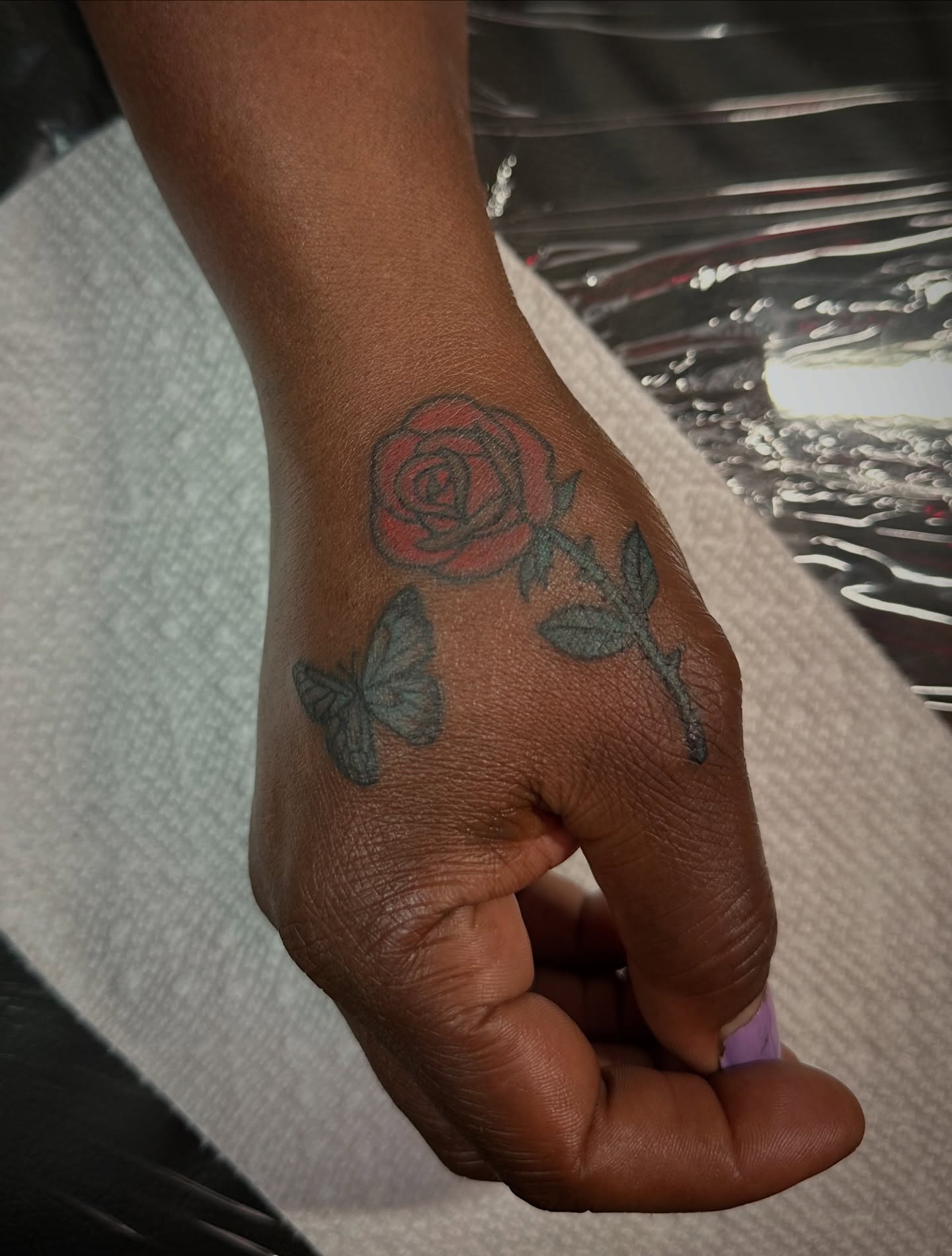 Rose and butterfly black and grey tattoo on the hand by π·πππ, Cleveland, Ohio