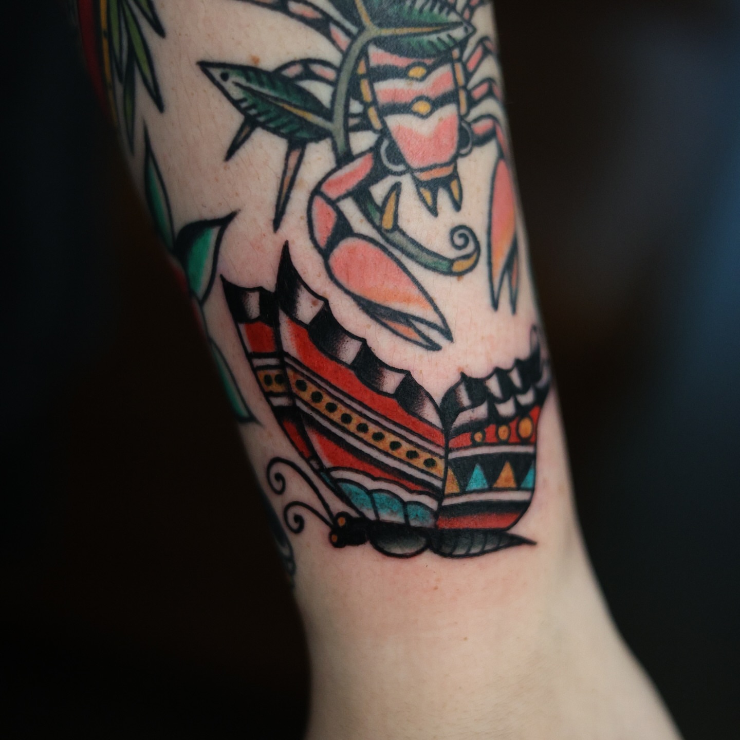 Skull American traditional tattoo on the forearm by Dylan Mott