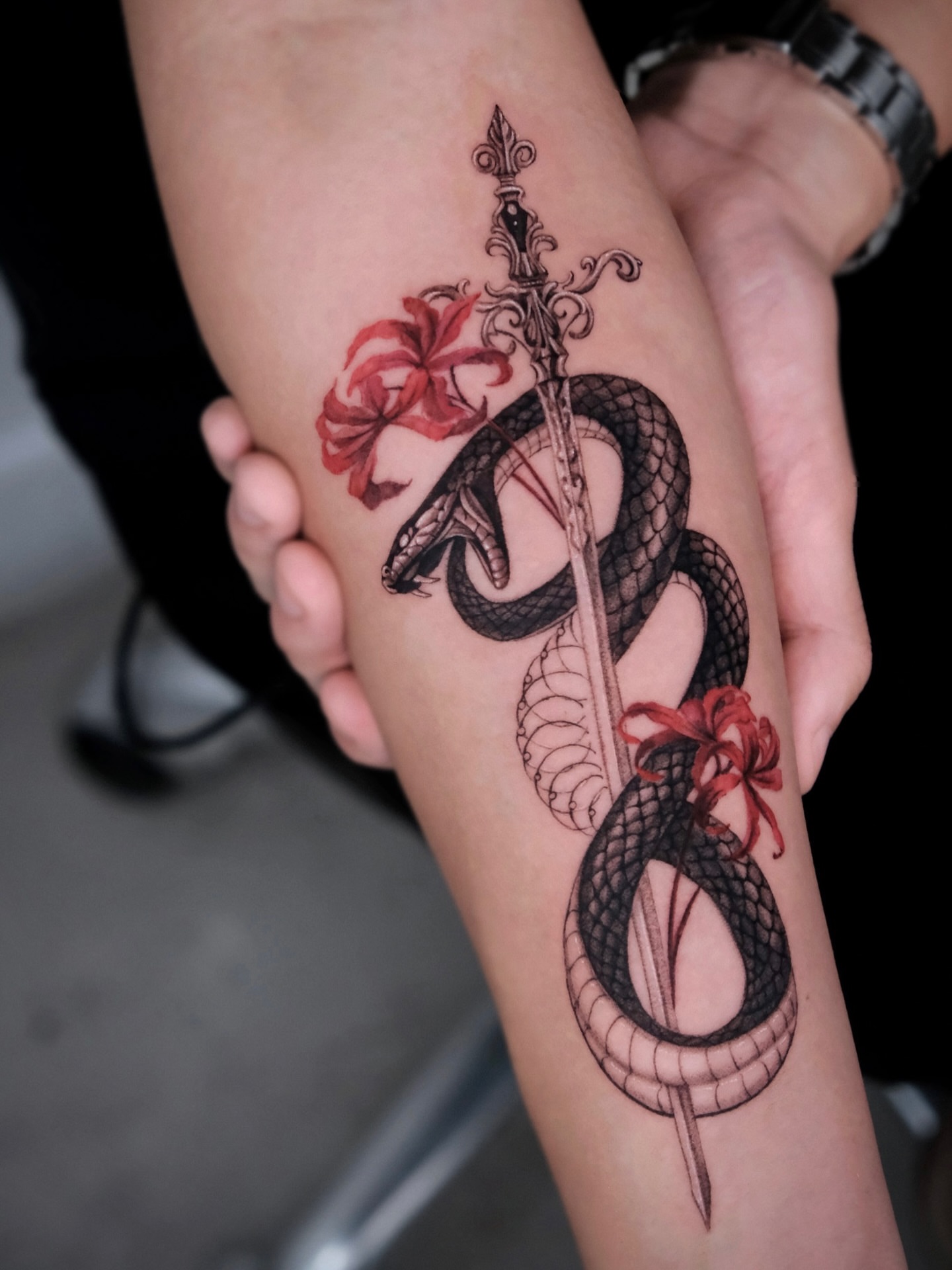 Snake and sword realism tattoo on the forearm by Da-An ･ﾟ✧ 다 안 𓇬˖