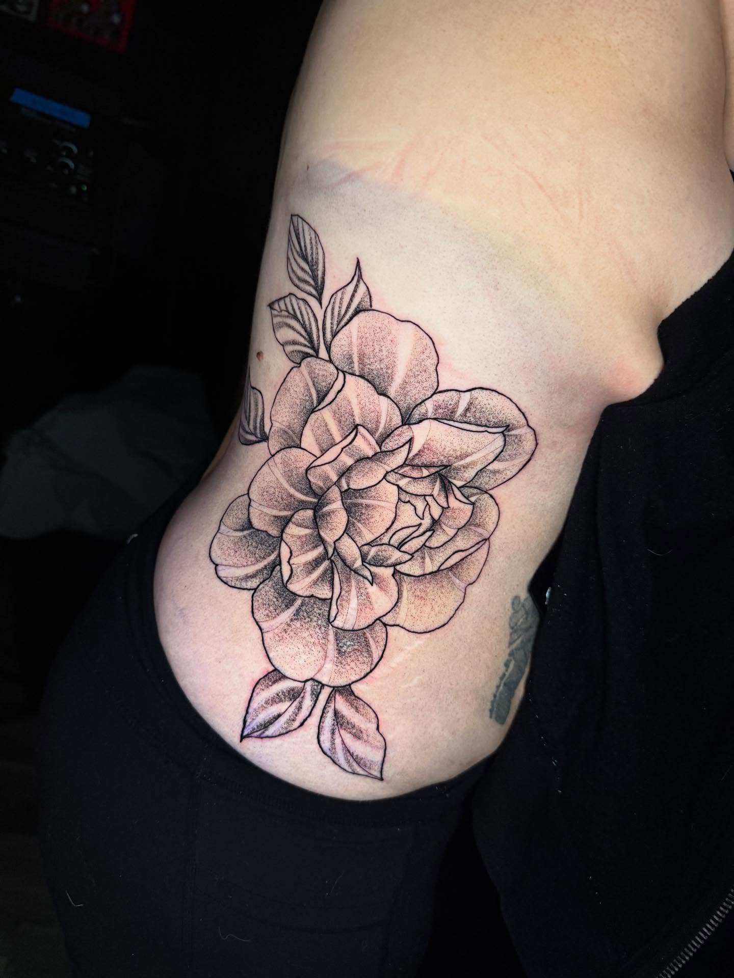 Flower black and grey tattoo by Adrián Banuelos