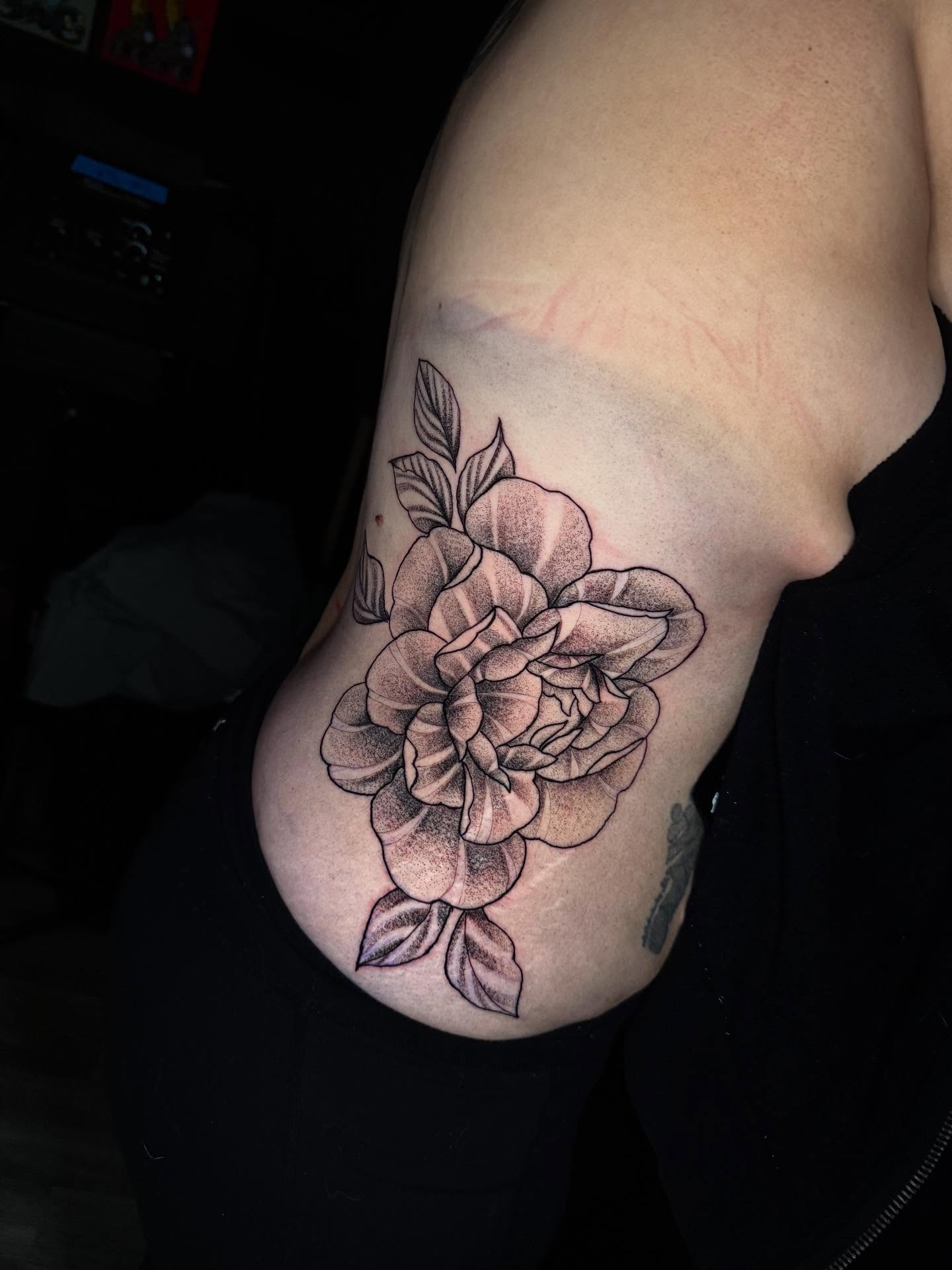 Peony dotwork tattoo on the shoulder by Adrián Banuelos