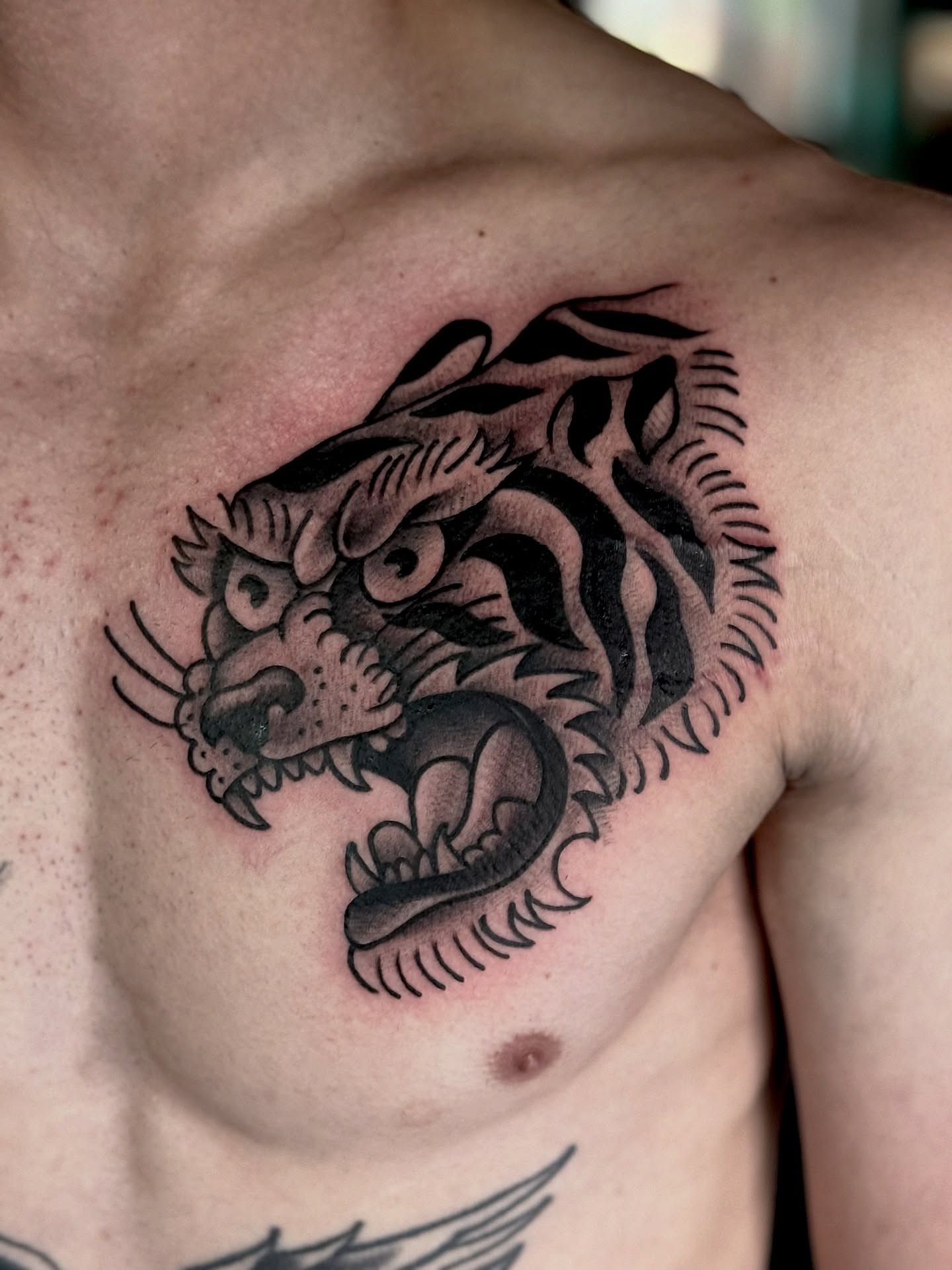 Dragon black and grey tattoo on the chest by Chris_Tatt2_D’Ascenzo