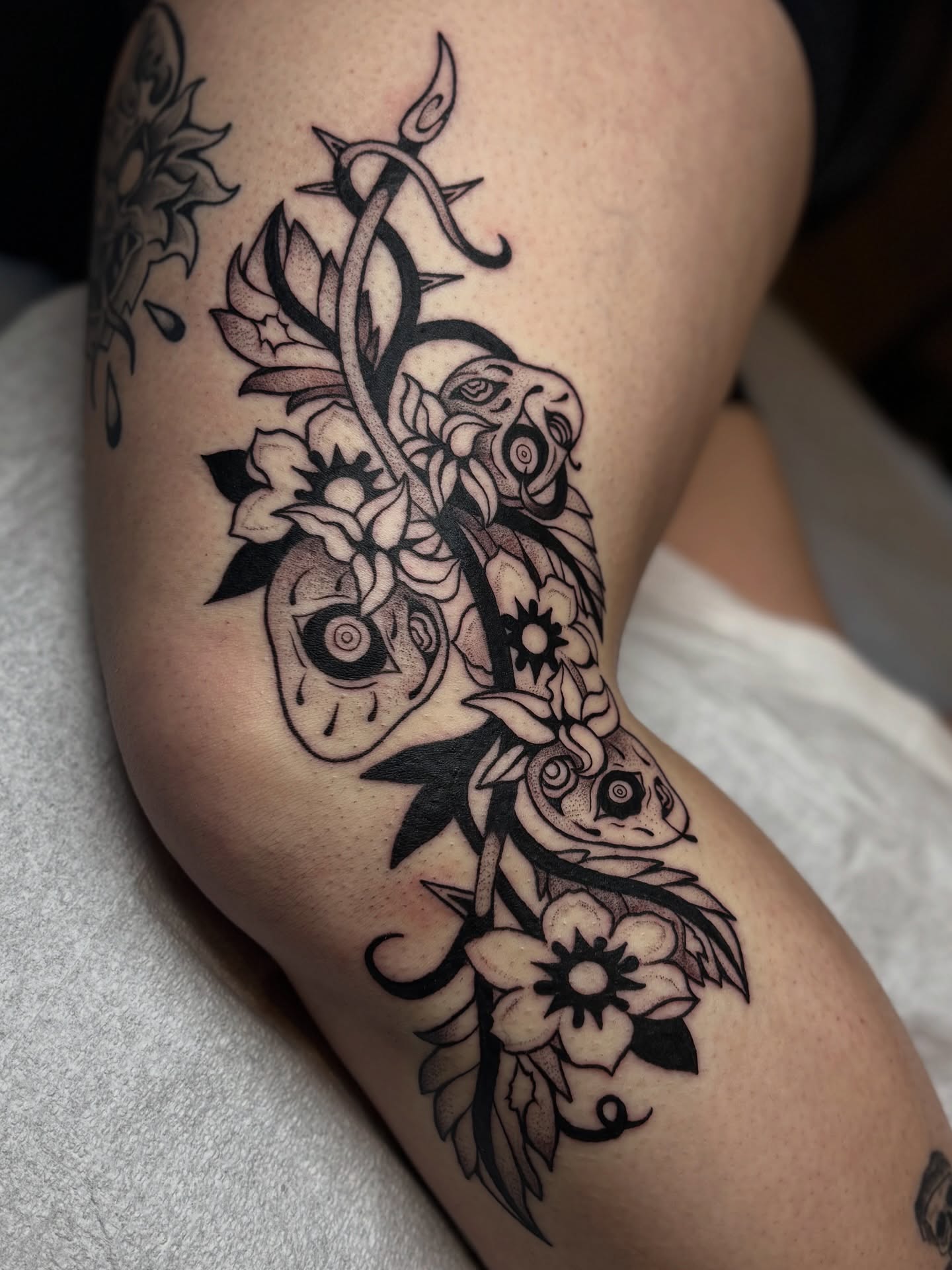 Snake and flowers geometric tattoo on the thigh by ๐ฅ Jas ๐ฅ