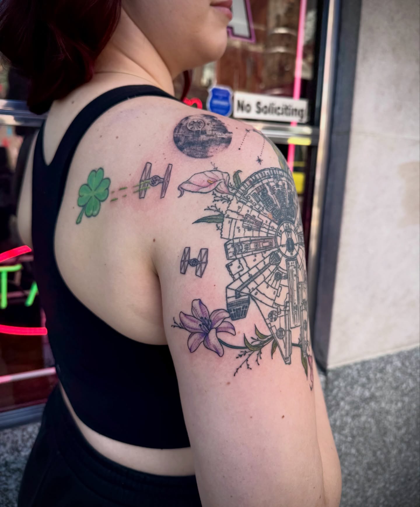 Millennium Falcon realism tattoo on the shoulder by Kylie Allen
