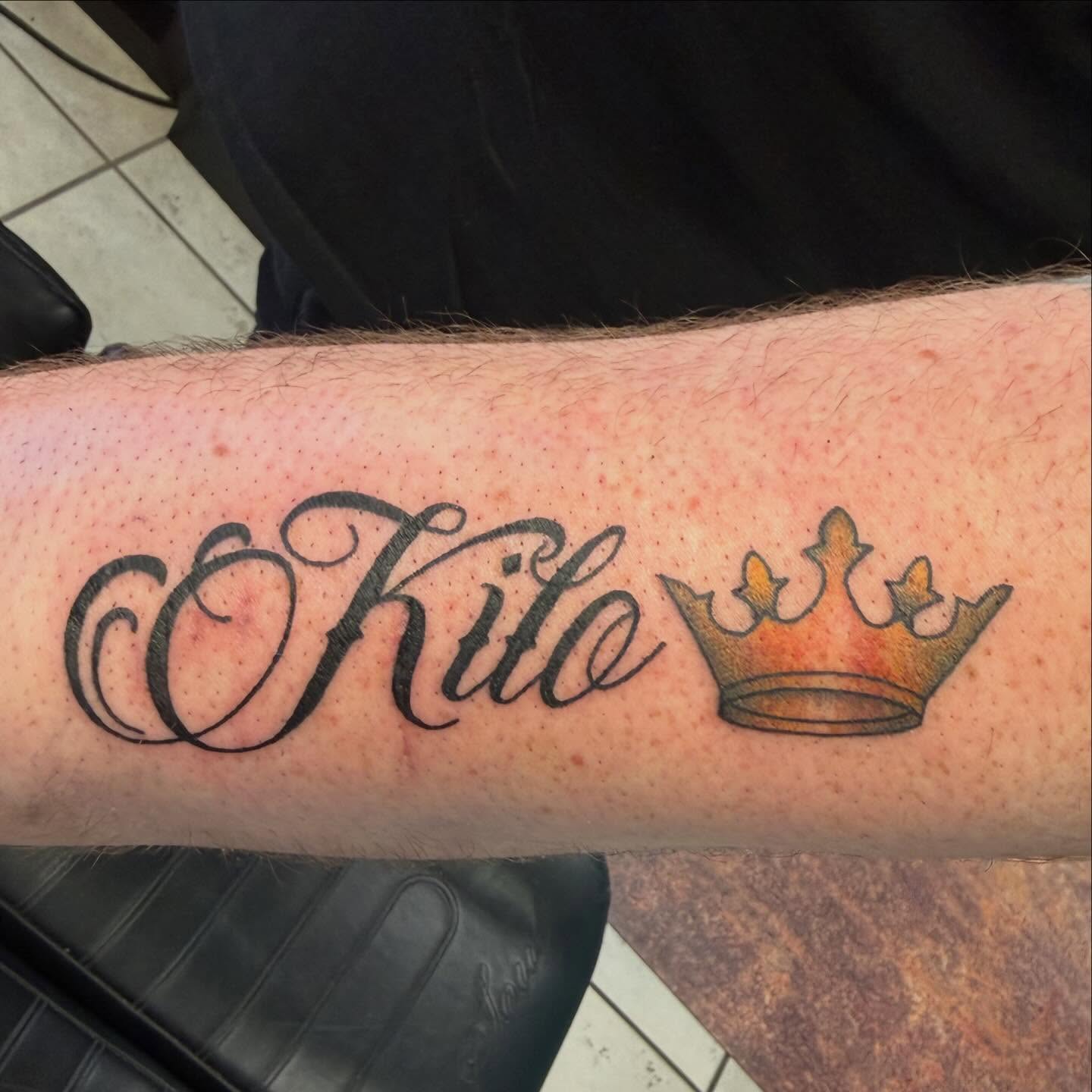 Name with crown lettering script tattoo on the forearm by Shan 🤘 Tattoo Artist ⚡️ MN 🌲