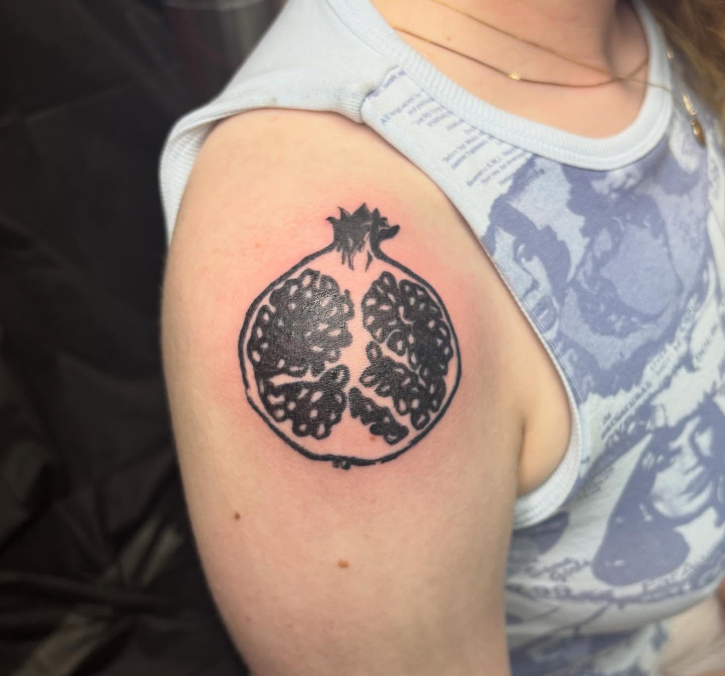 Pomegranate black and grey tattoo on the shoulder by Joe ⋆₊⋆☢︎⁺₊⚠︎₊⋆