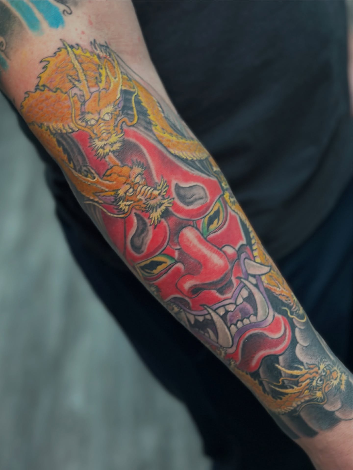 Demon mask japanese irezumi tattoo on the forearm by Skoty Fox