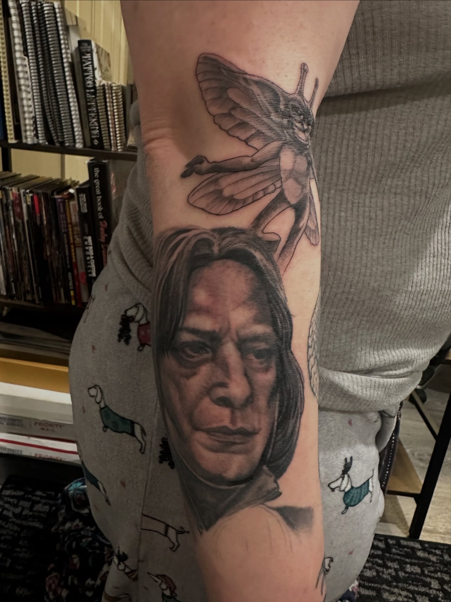 Woman's face realism tattoo on the forearm by Skoty Fox