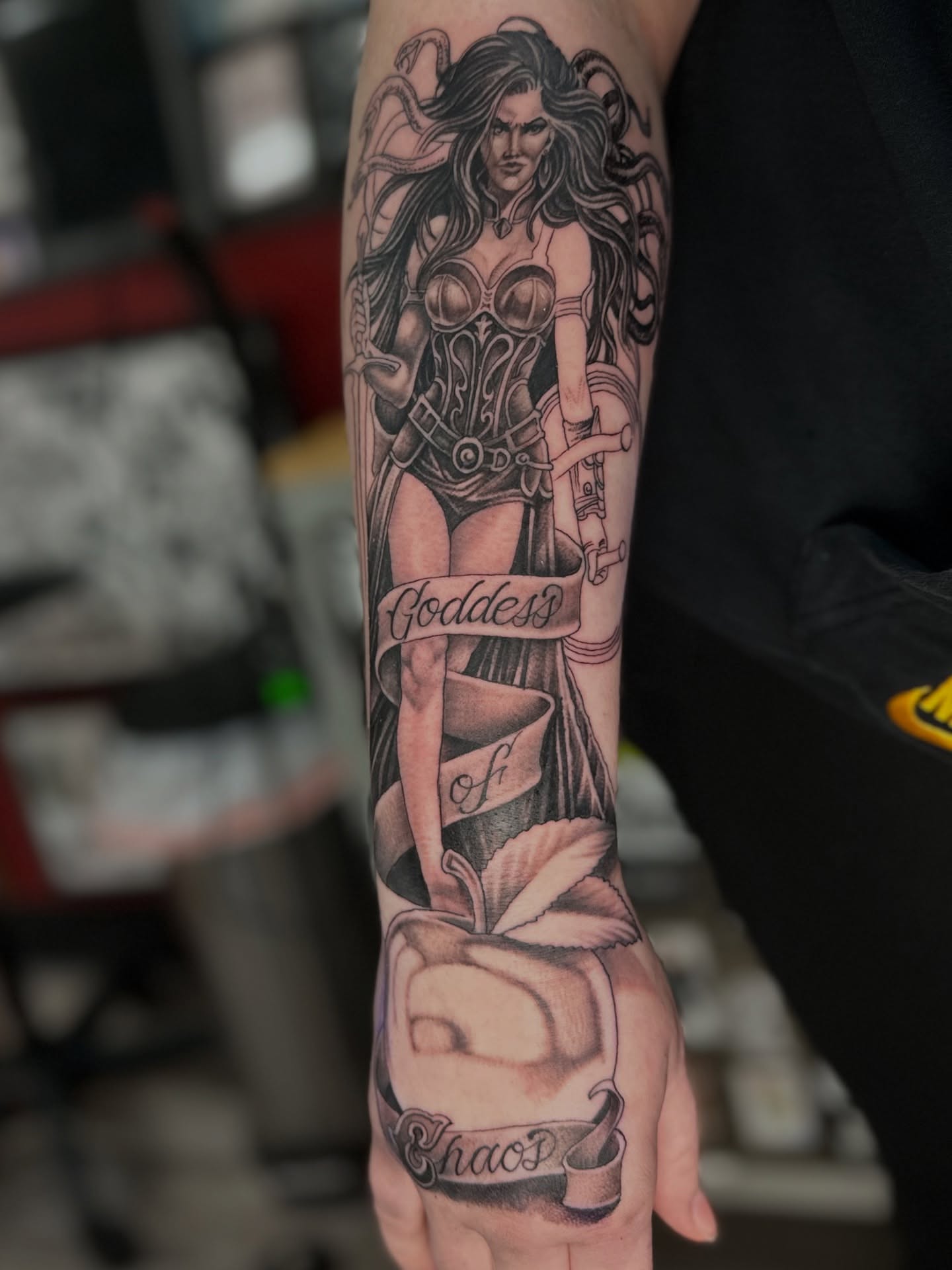 Goddess with sword realism tattoo on the forearm by Skoty Fox