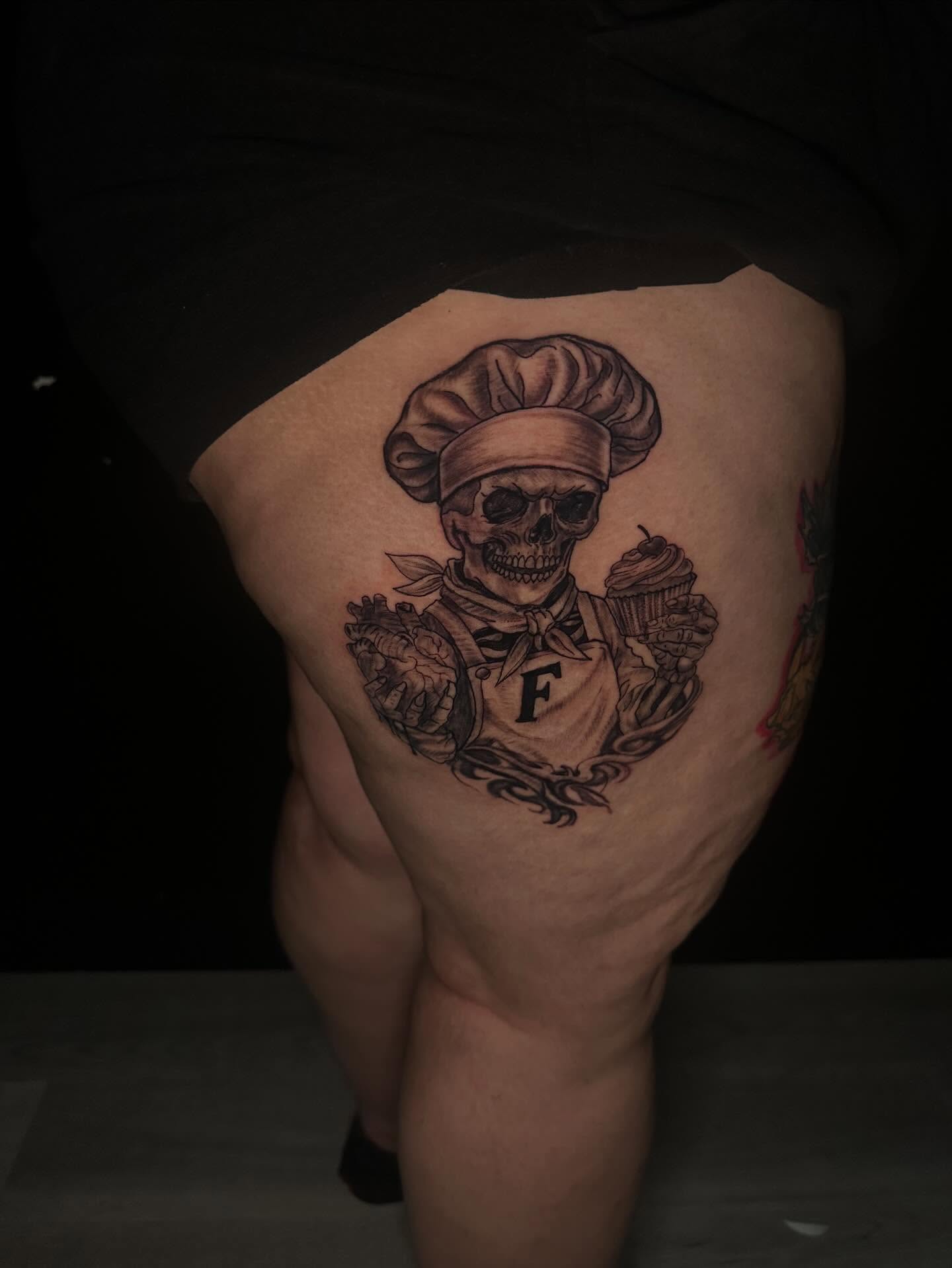 Chef skull black and grey tattoo on the thigh by Aj Negrete Jr.