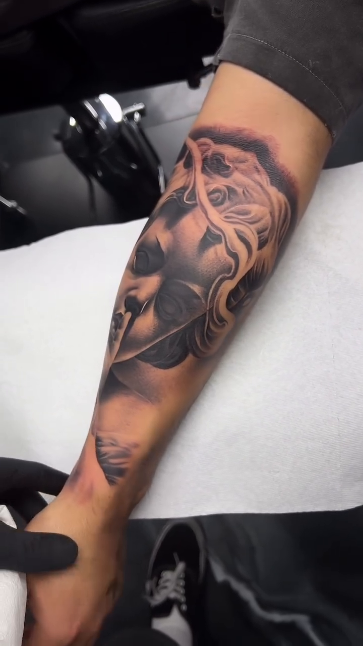 Woman with smoke realism tattoo by Antonio Pavić, Los Angeles, California
