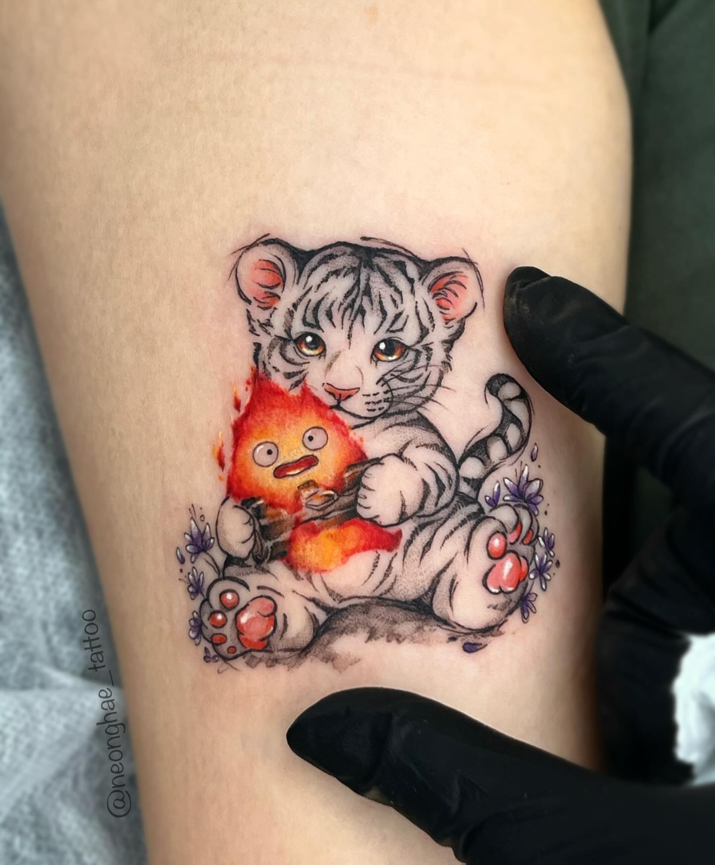 Tattoo by @neonghae_tattoo — realism, watercolor