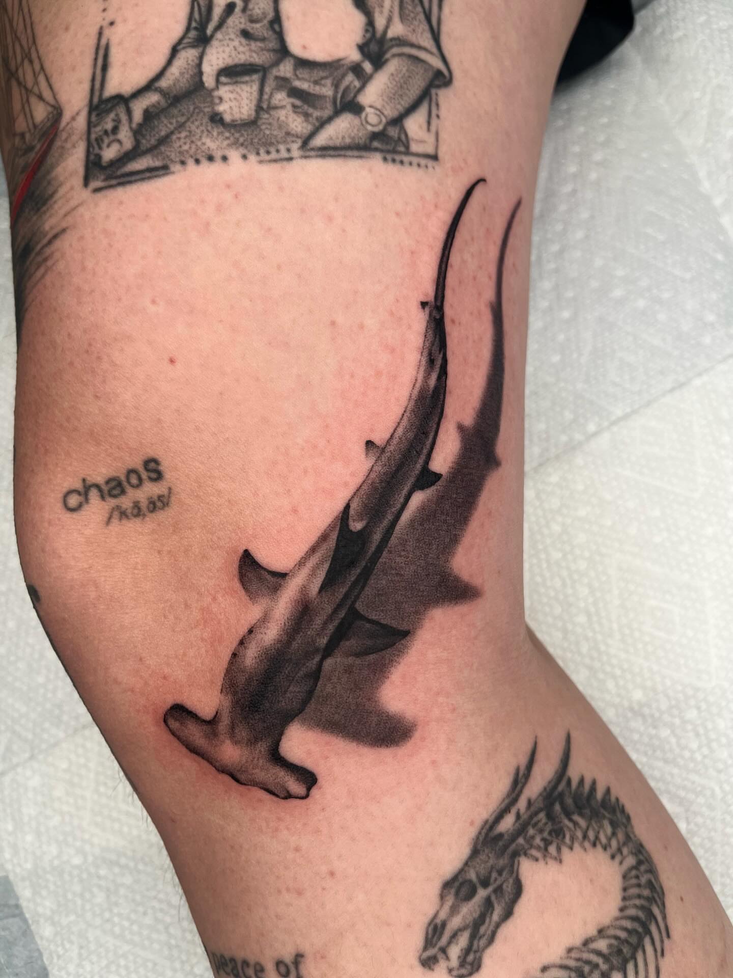 Shark black and grey tattoo on the thigh by zach arlan, Kansas City, Missouri