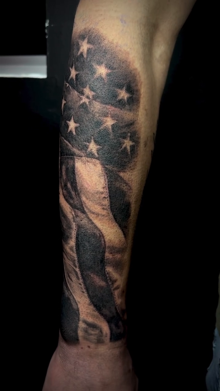 American flag realism tattoo by Brooks