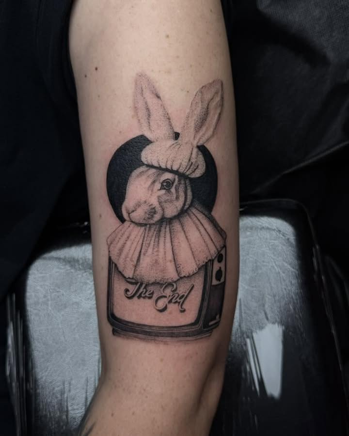 Rabbit clown dotwork tattoo on the forearm by Madison Jasso