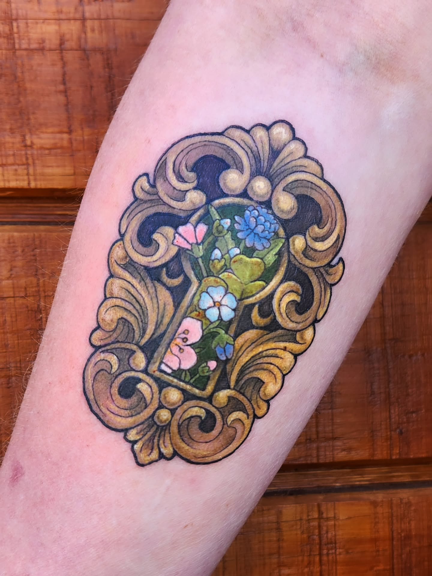 Mirror and flowers ornamental tattoo on the forearm by Amanda Boyd - Duh!