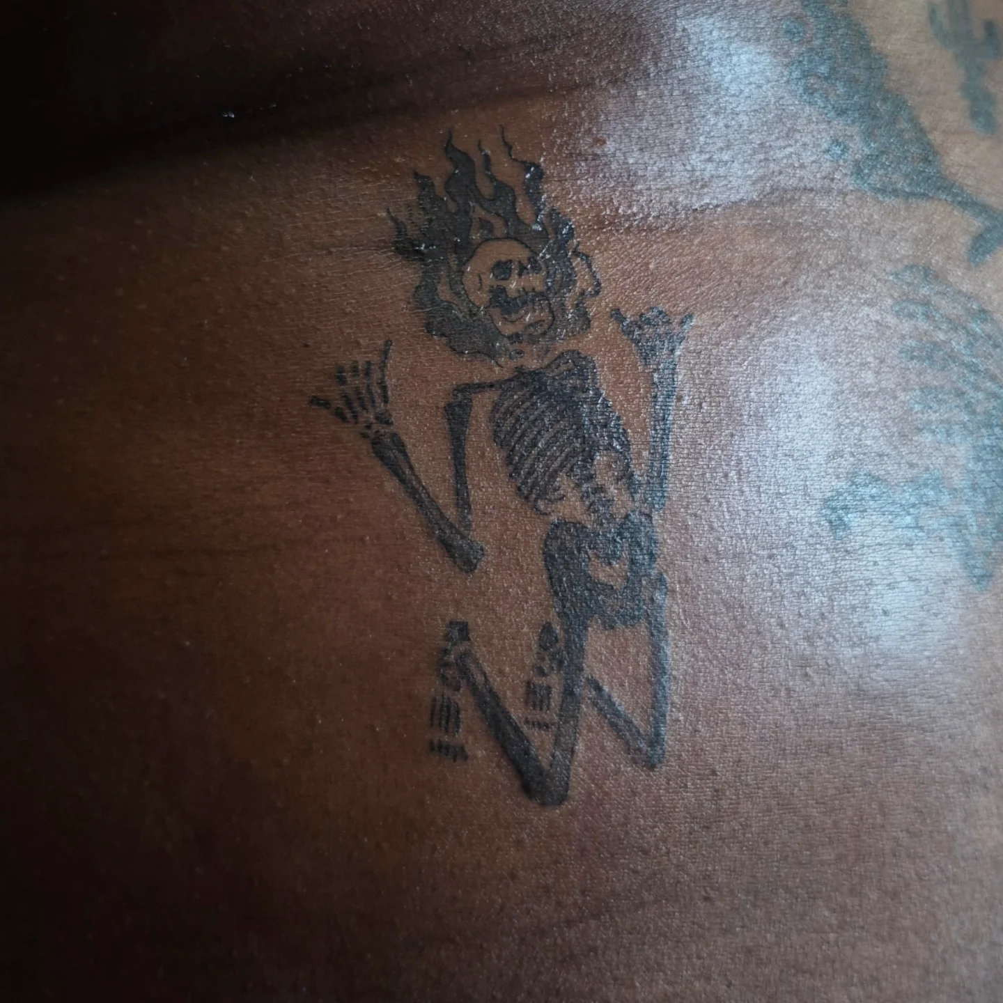 Skeleton black and grey tattoo on the back by Lydia Kiley