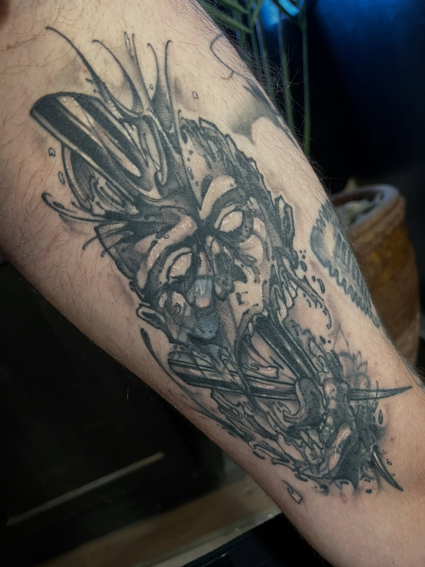 Mask black and grey tattoo on the forearm by Owen Smith -OEOS- SF