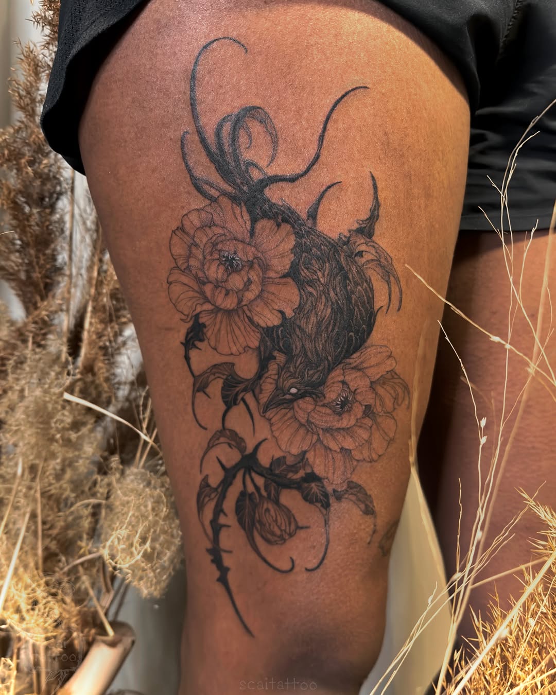 Raven and flowers cyber sigilism tattoo on the thigh by scaitattoo