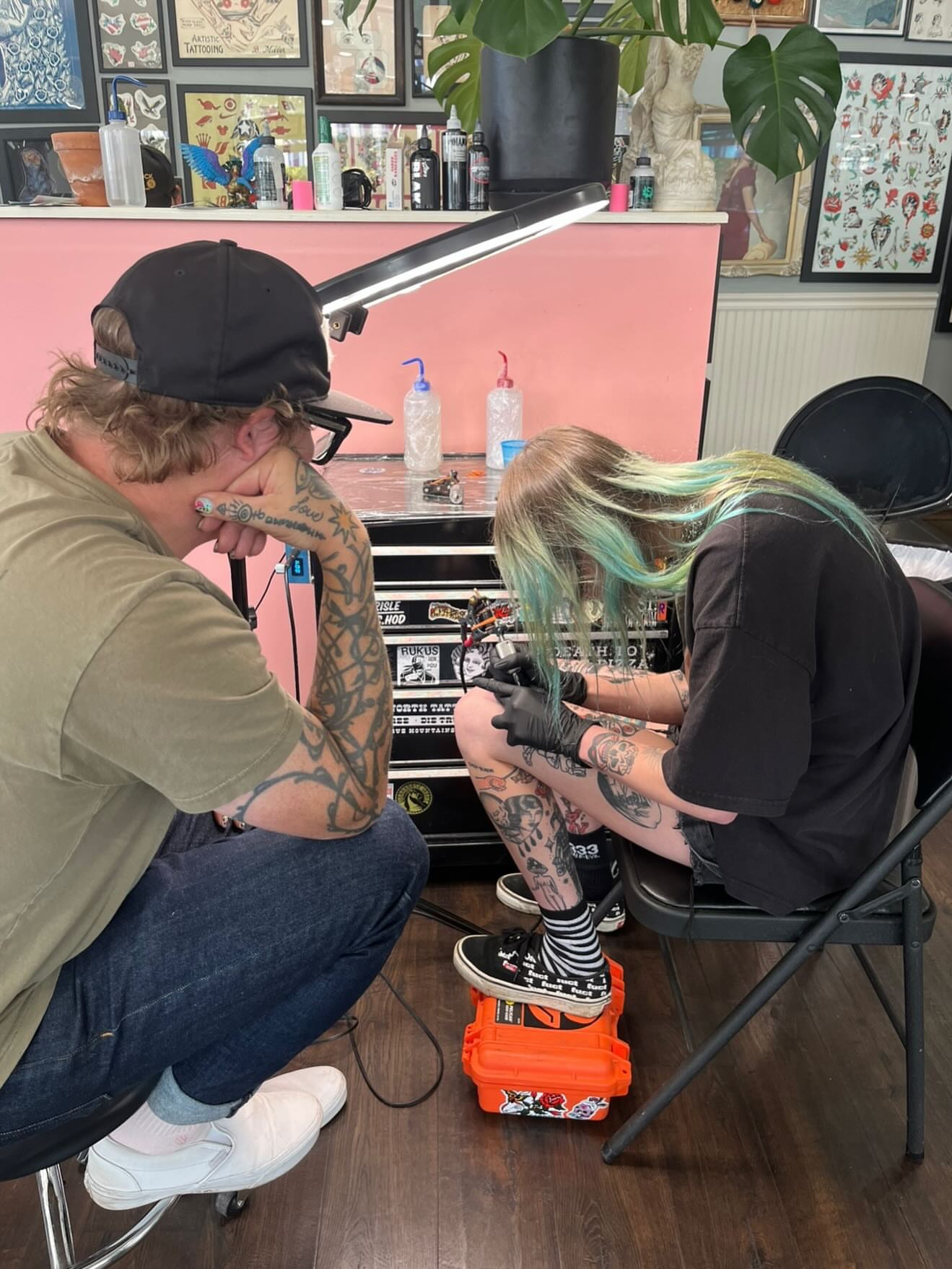 Tattoo artist and client American traditional tattoo on the upper arm by kalli berry